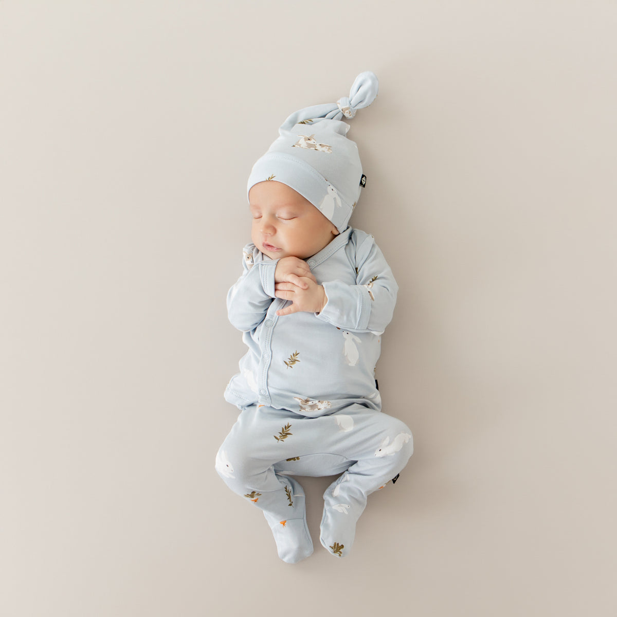 Baby wearing Take Me Home Set with Cap in Ice Rabbit