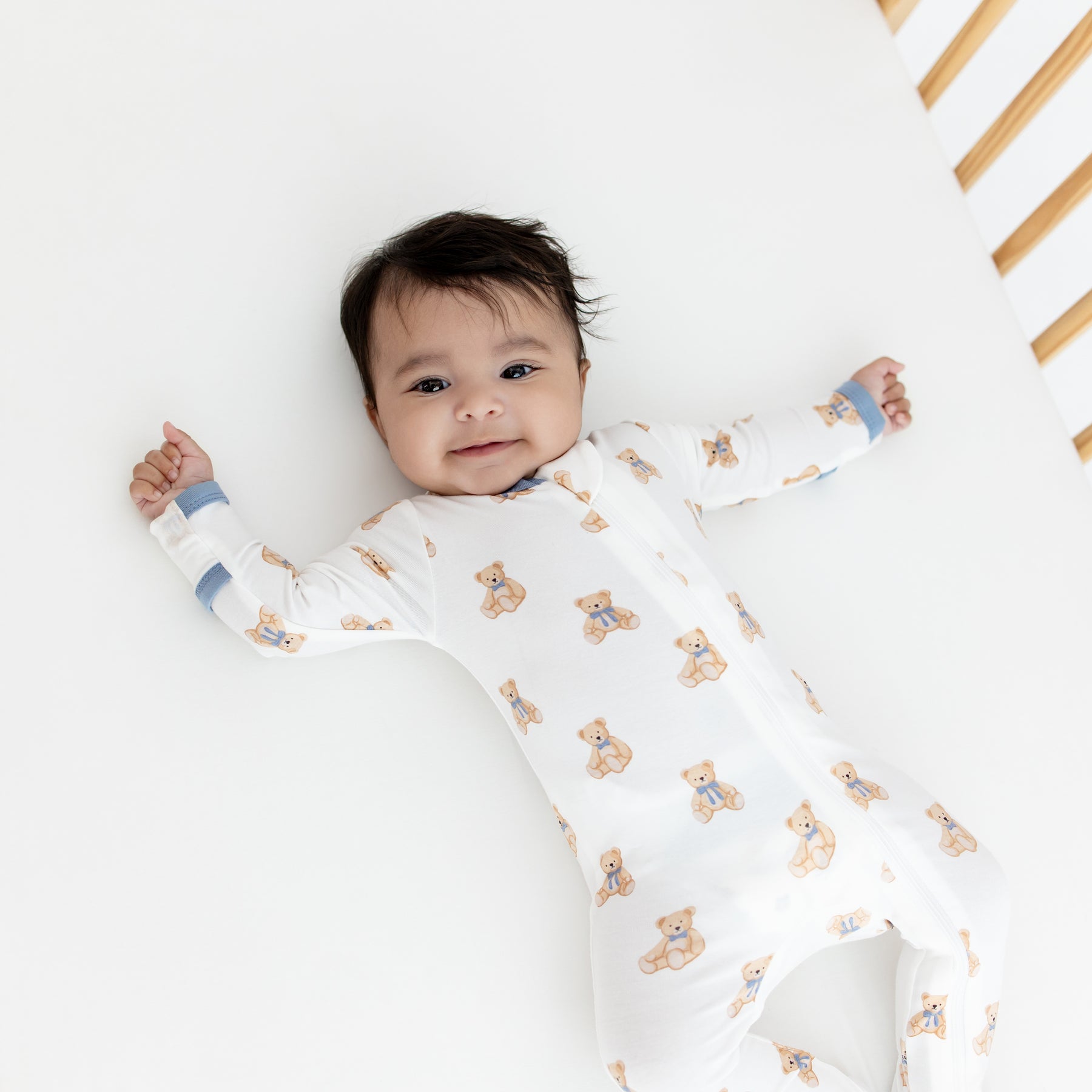 Baby in teddy bear zippered footie