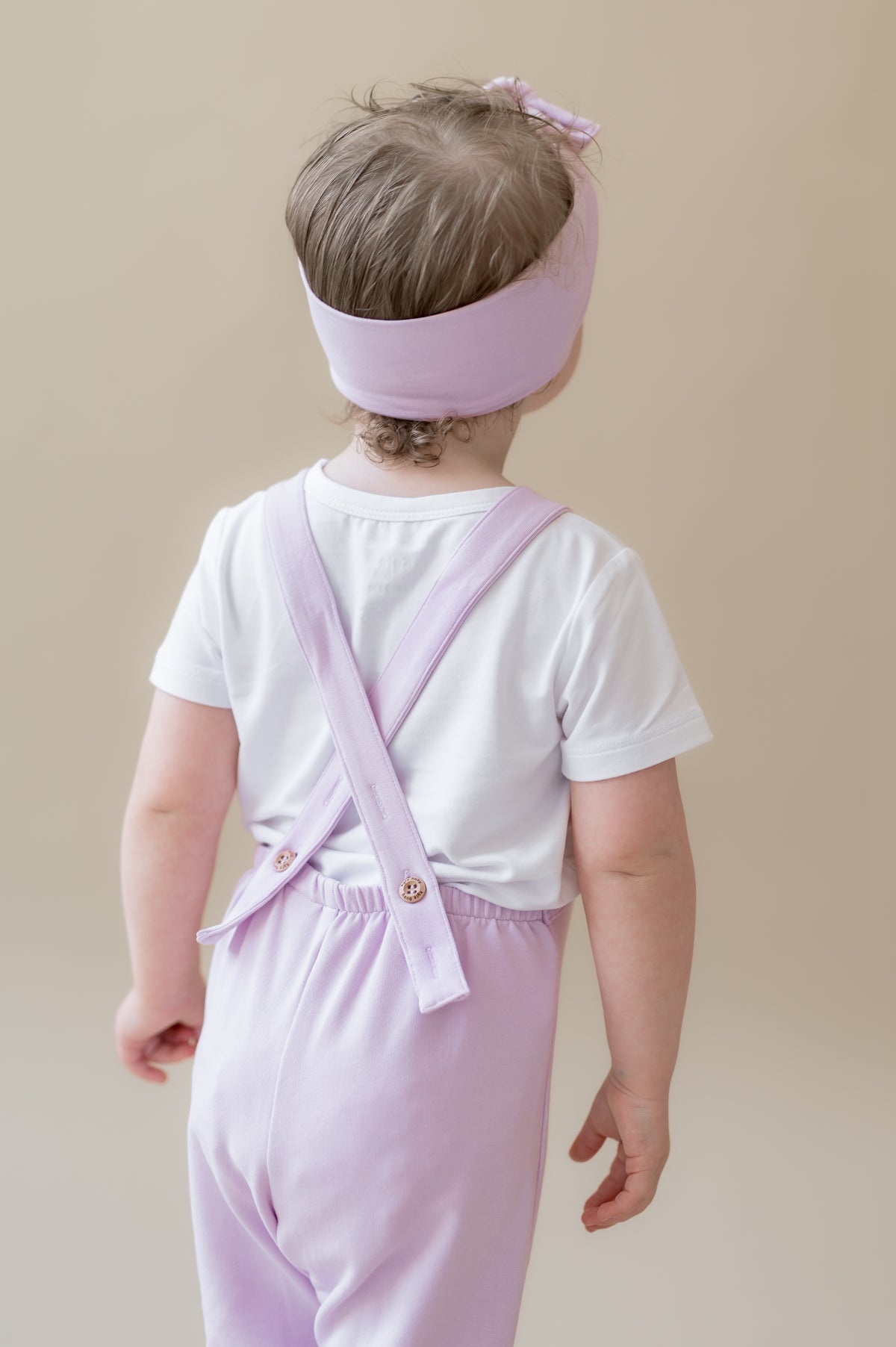 The back of the Overall in Thistle showing the cross straps