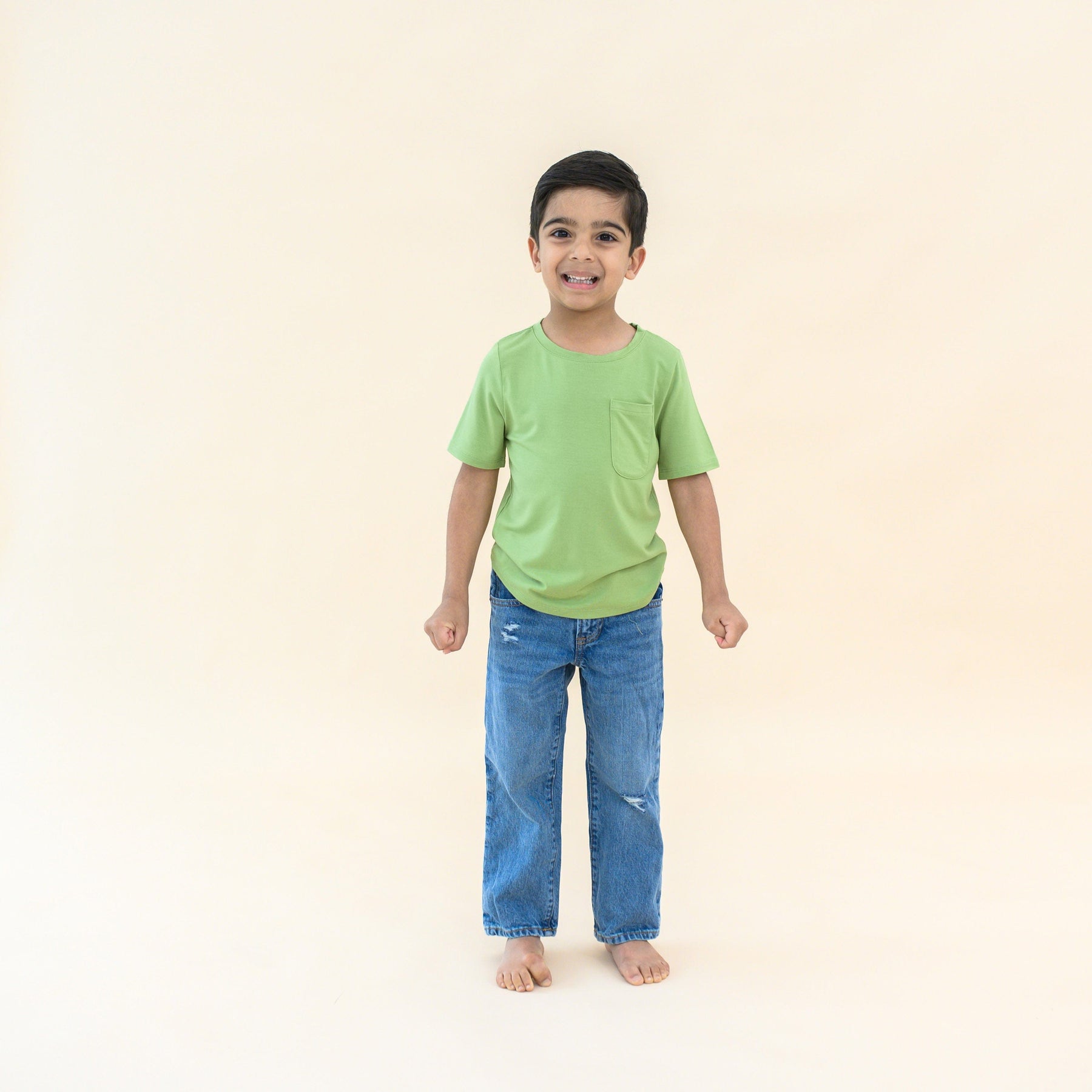 toddler modeling crew neck tee in honu