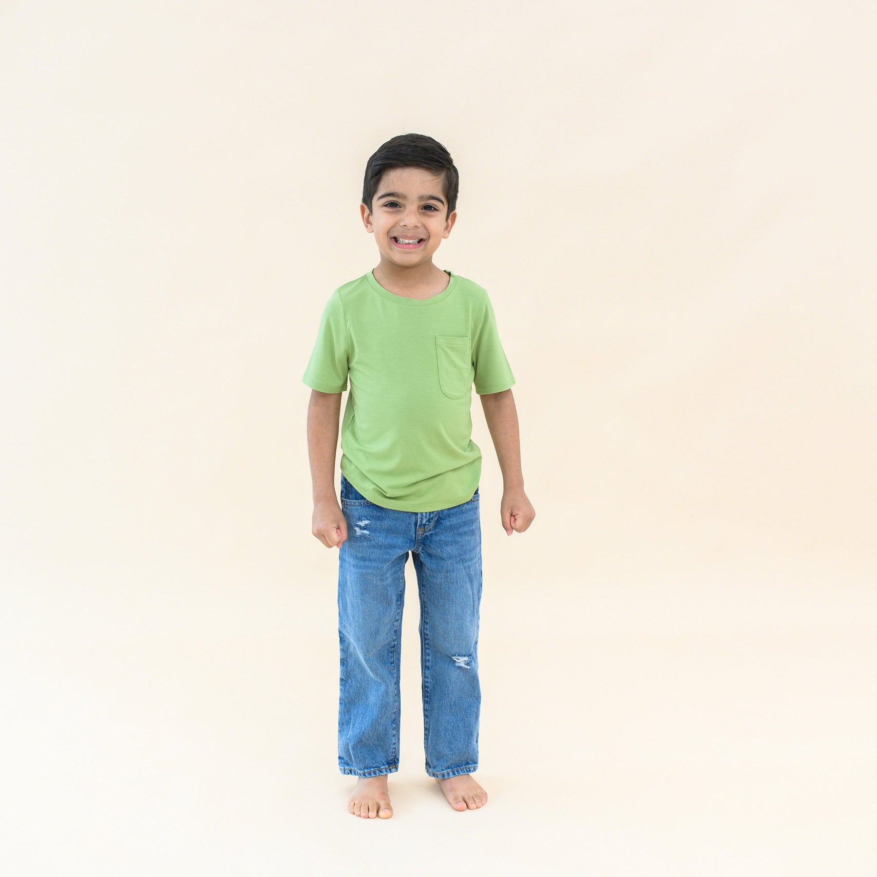 toddler modeling crew neck tee in honu