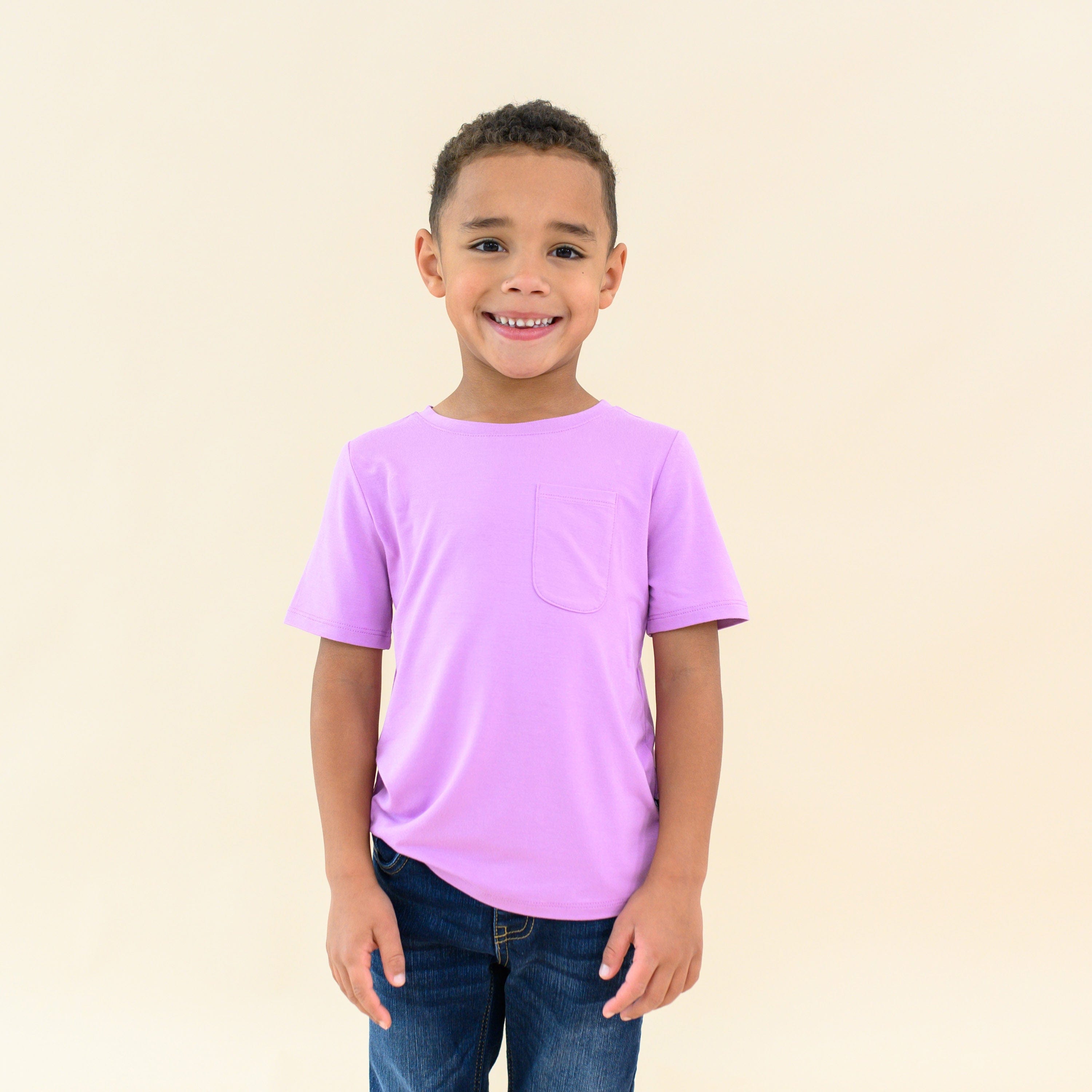 Child wearing Toddler Crew Neck Tee in Poi Purple