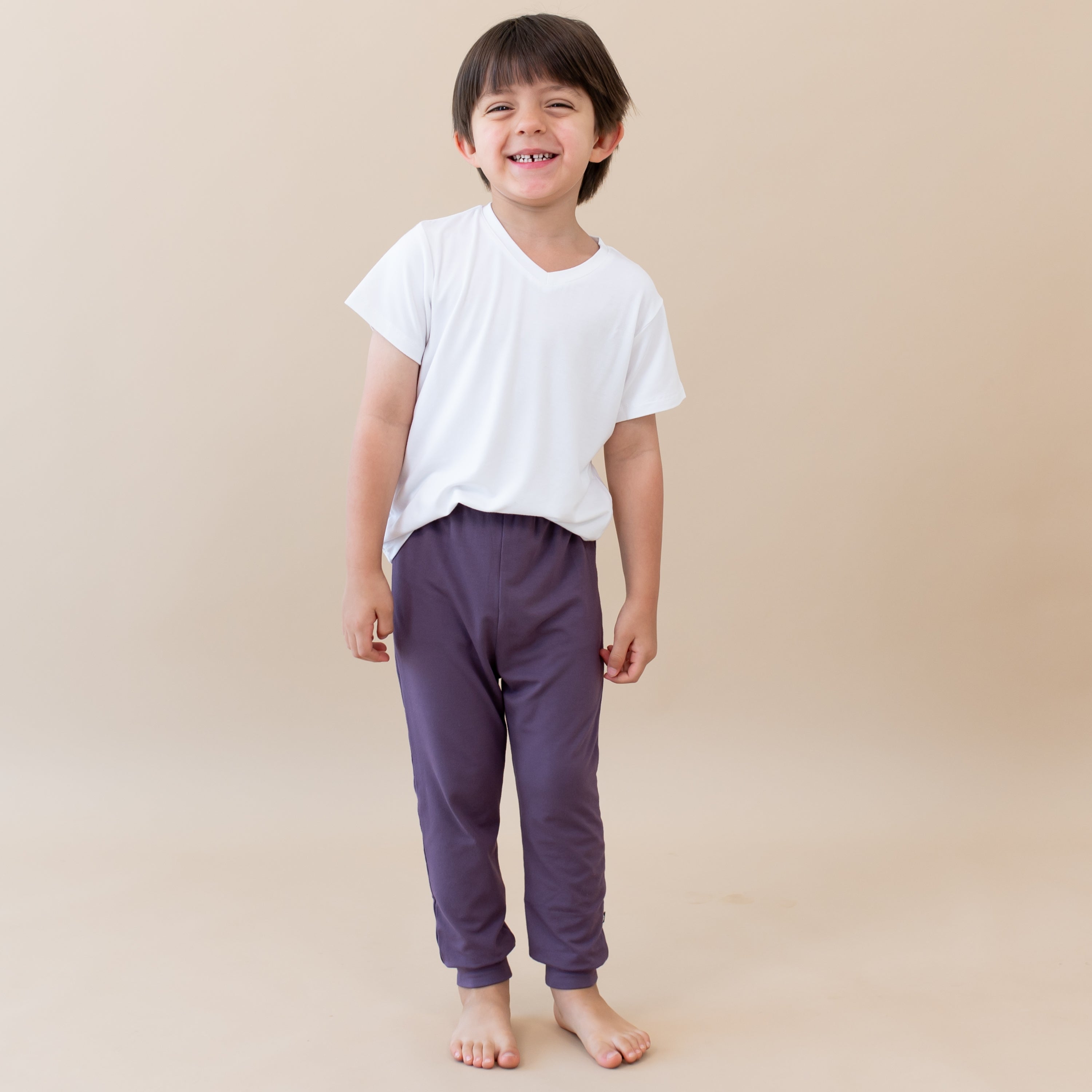 Toddler modeling Pant in Currant close up