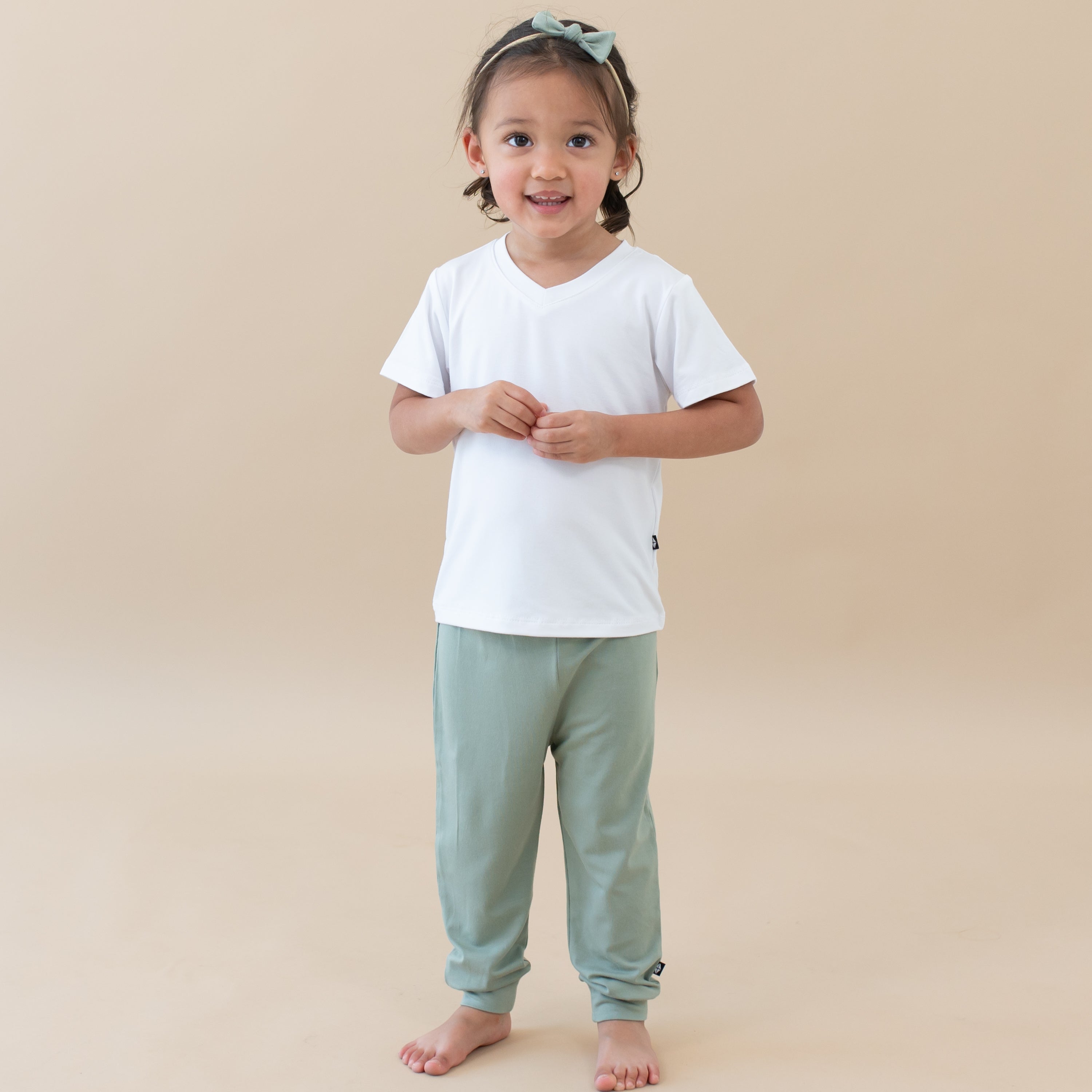 Toddler modeling Pant in Thyme 