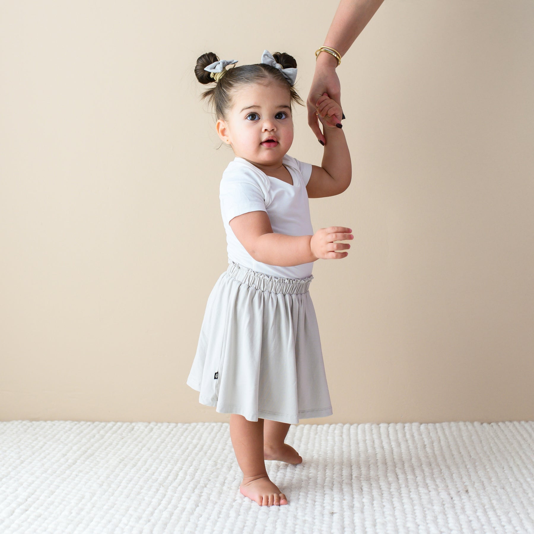 toddler modeling Toddler Skort in Oat