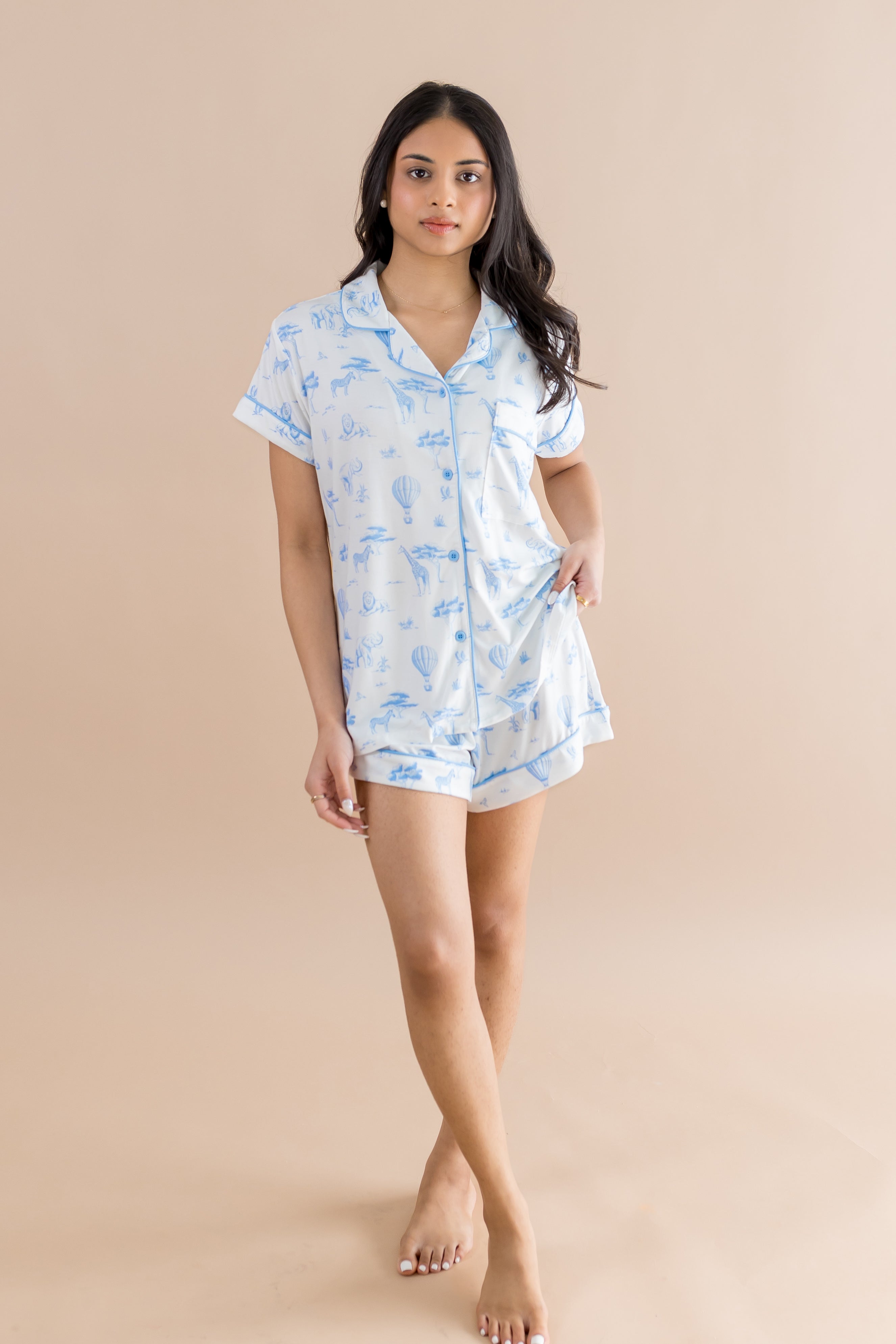 Female model posing wearing the Women's Short Sleeve Pajama Set in Toile Safari