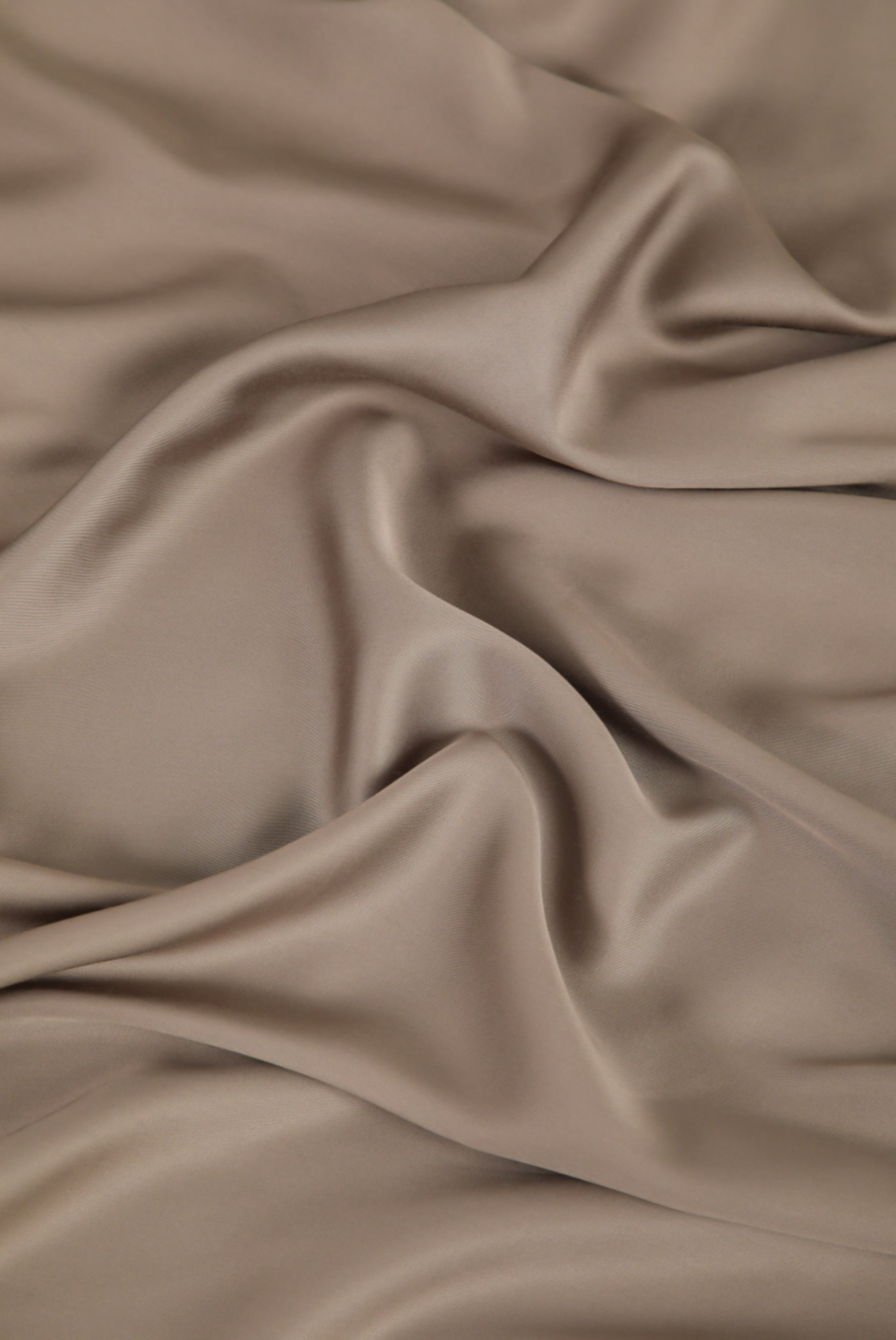 Close up of the Bamboo Sateen Sheet Set in Truffle fabric