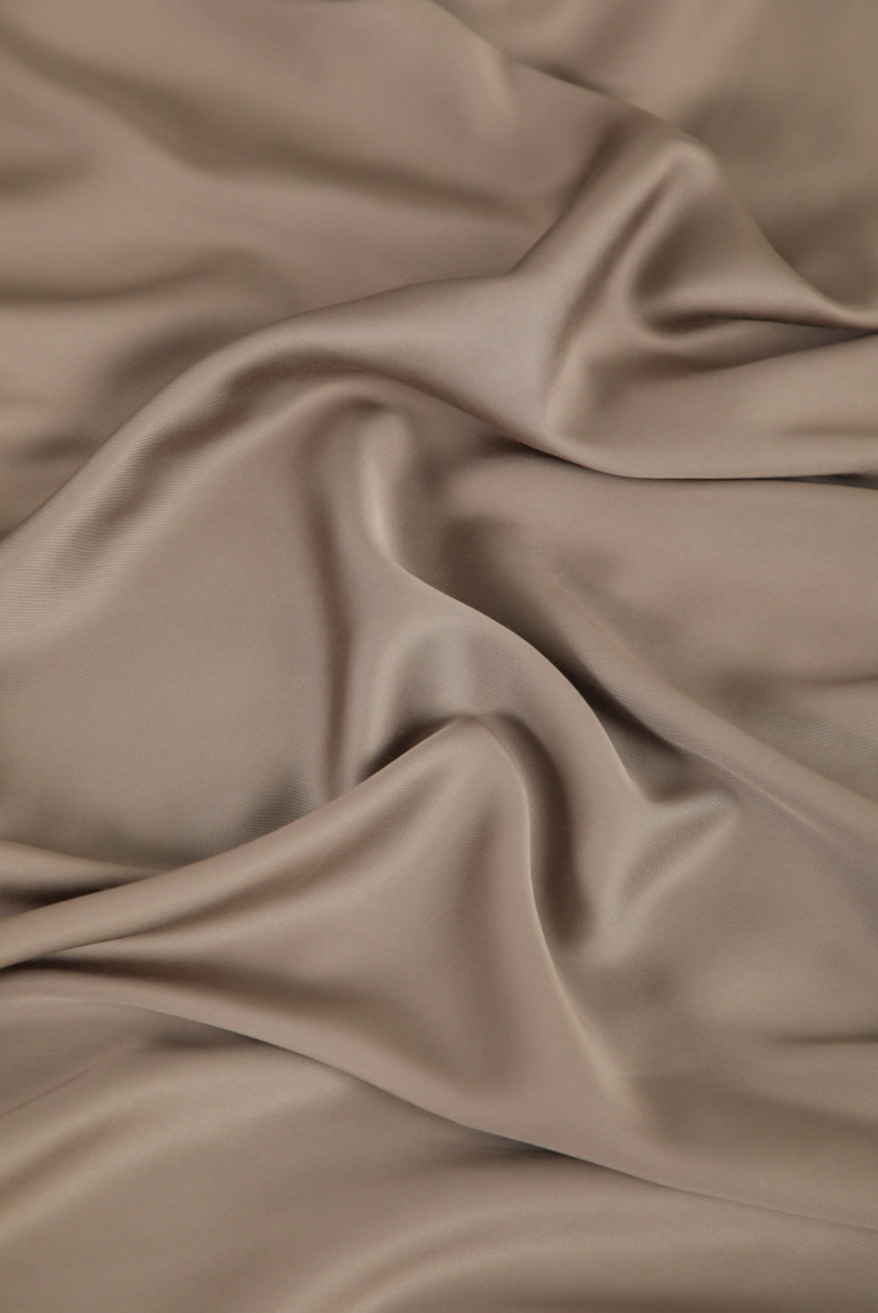 Close up of the Bamboo Sateen Sheet Set in Truffle fabric