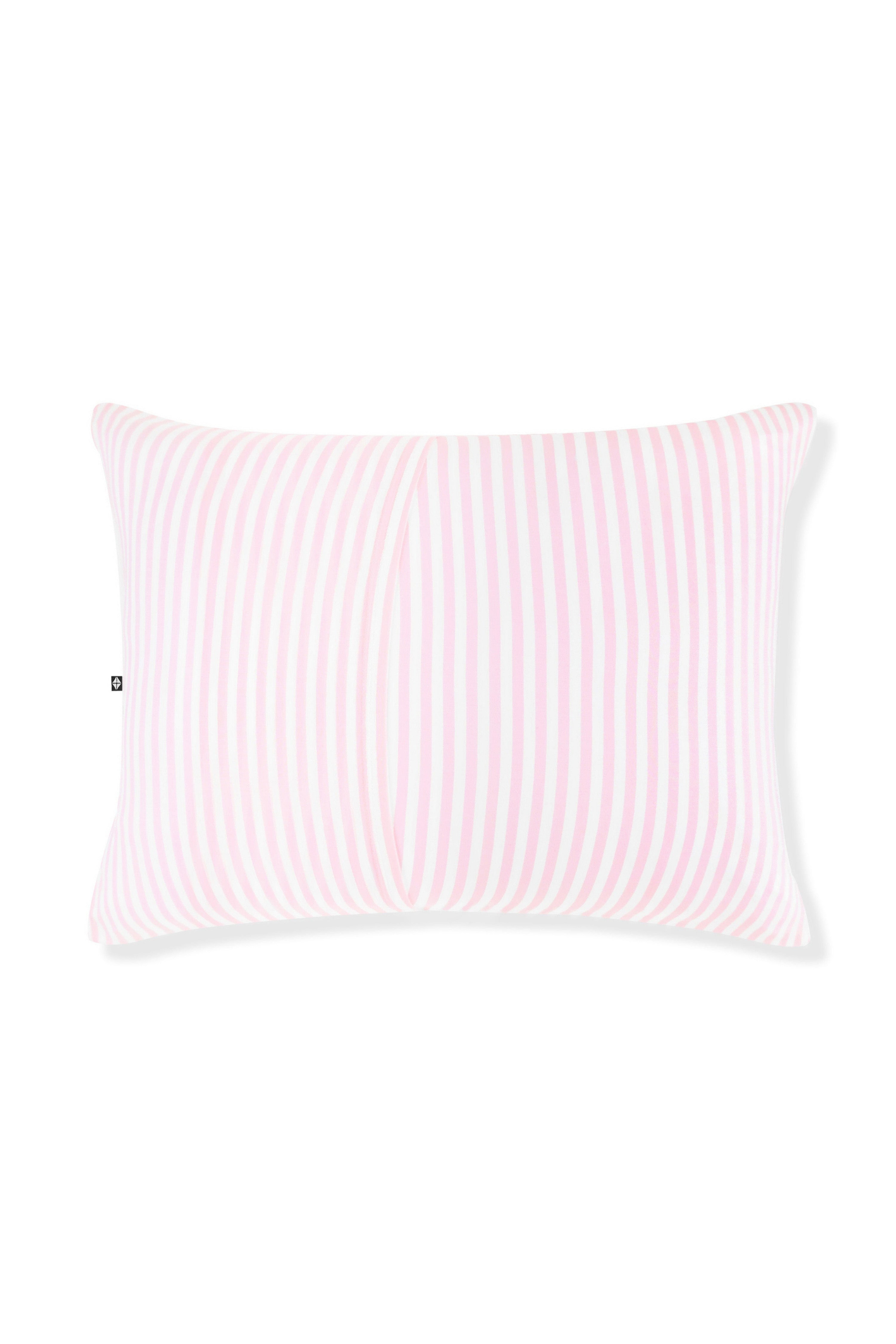 Pink striped pillow on a white background