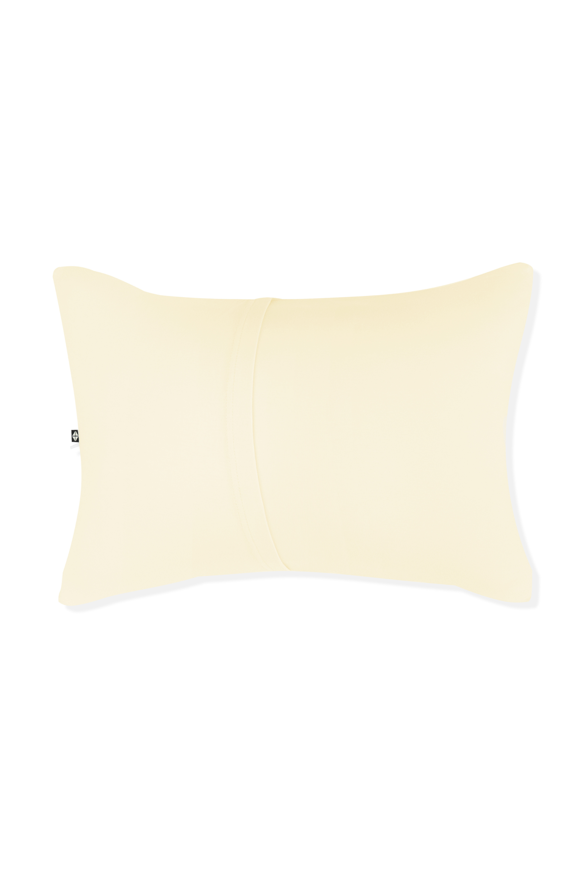 Yellow pillow with envelope closure on a white background