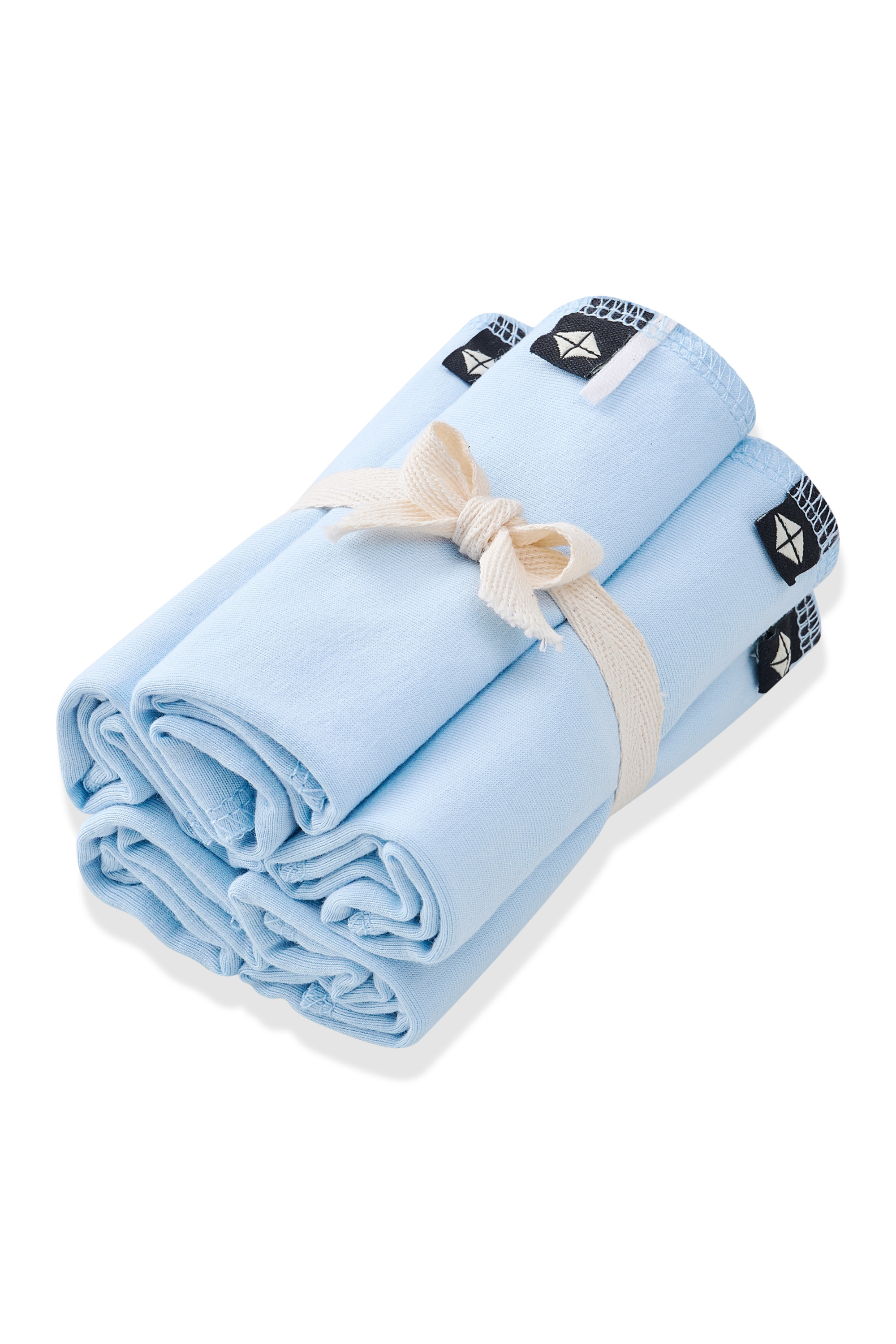 Bundle of Washcloth 5-Pack in Breeze shown in its packaging tied with a linen bow