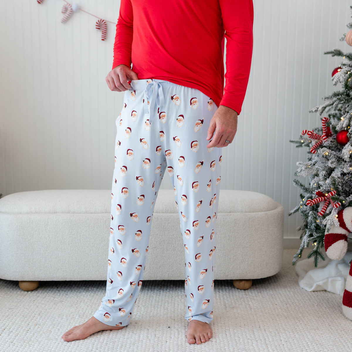 Men's Lounge Pants in Vintage Santa shown on a male model