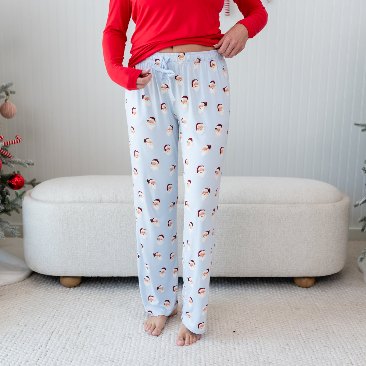 Women's Lounge Pants in Vintage Santa shown on a female model