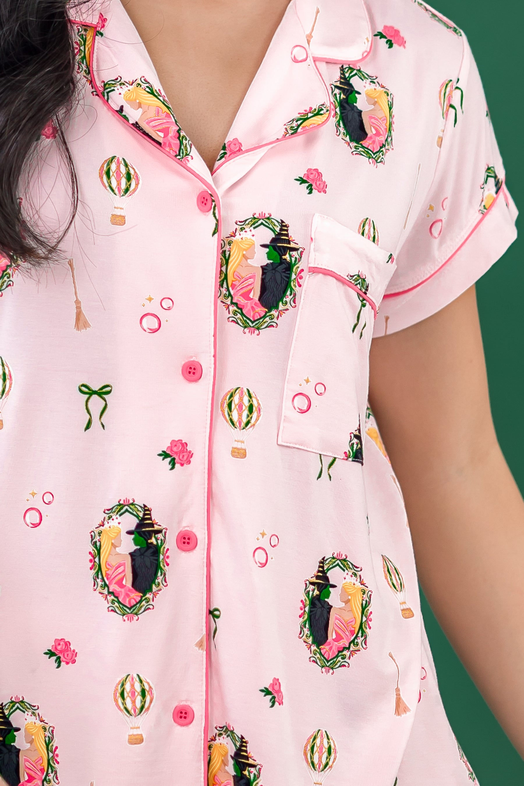 Close up of the button closure and chest pocket on the shirt on the Women's Short Sleeve Pajama Set in Wicked