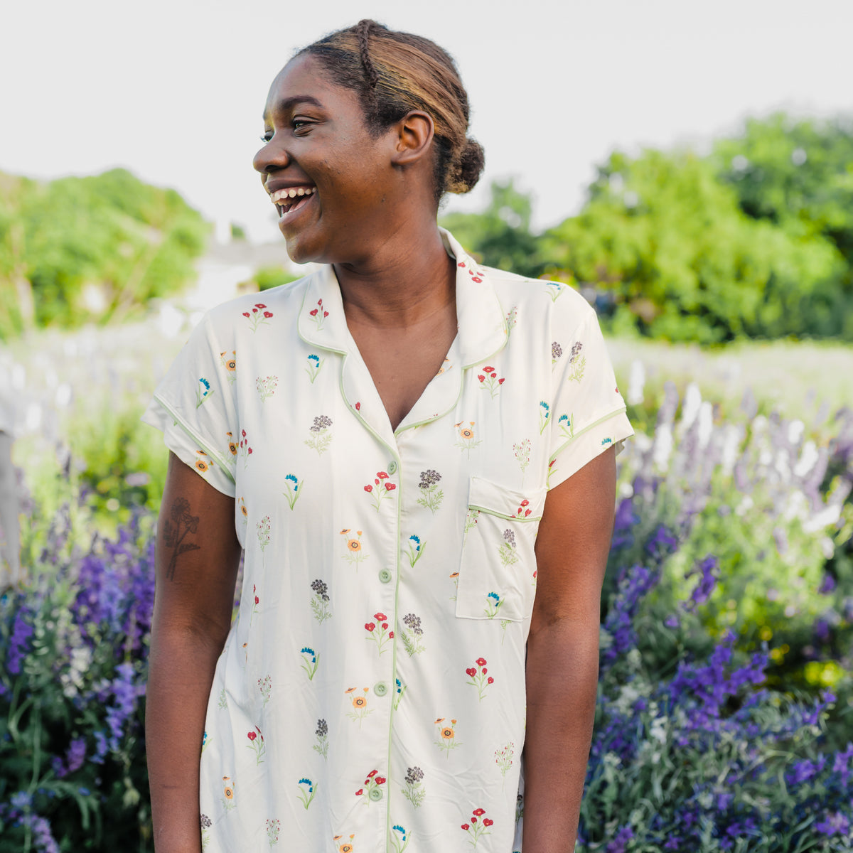 Woman modeling Women’s Short Sleeve Pajama Set in Wildflower in a wildflower field 
