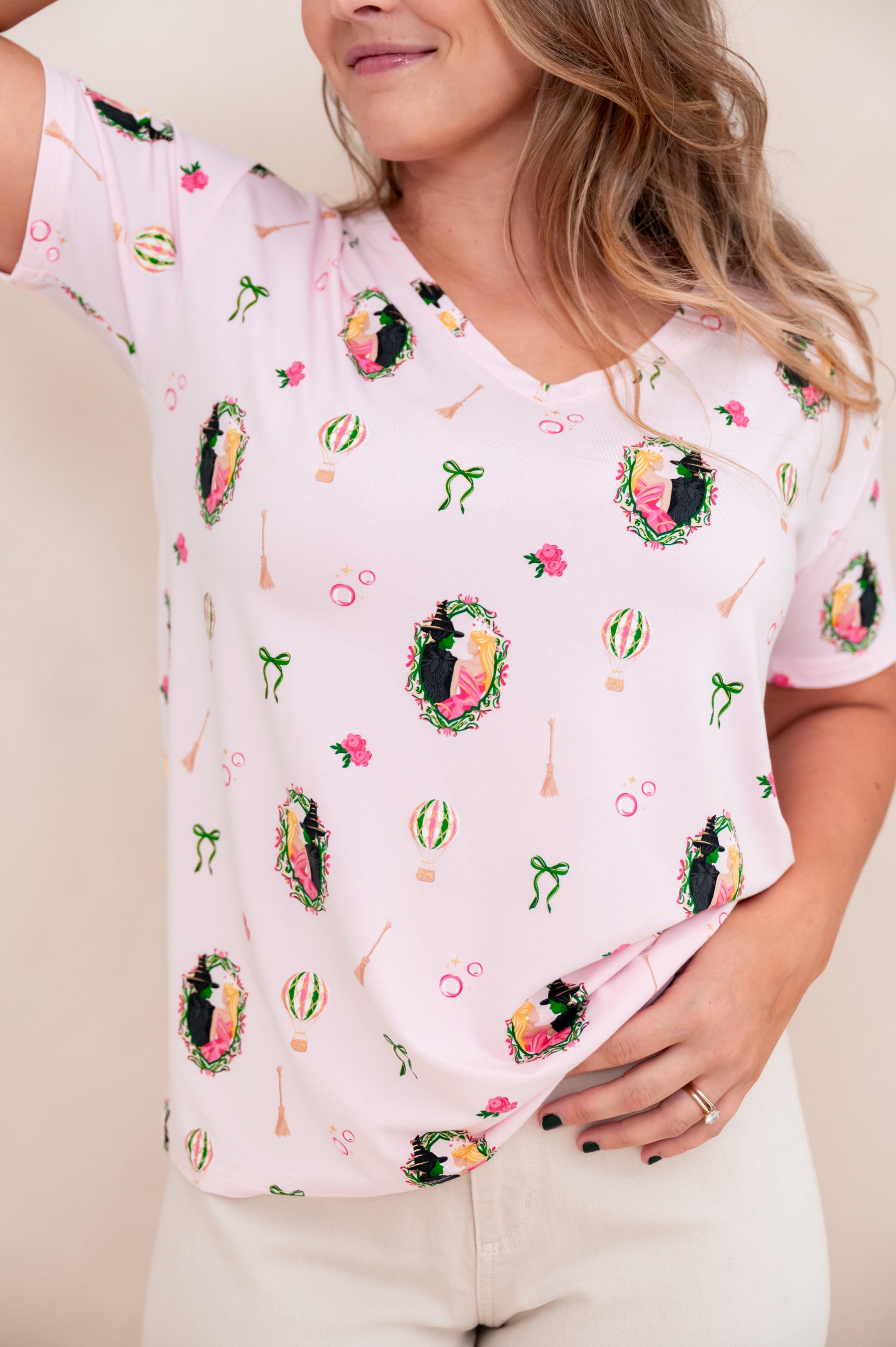 Close up of the Women's Relaxed Fit V-Neck in Wicked shown on a model