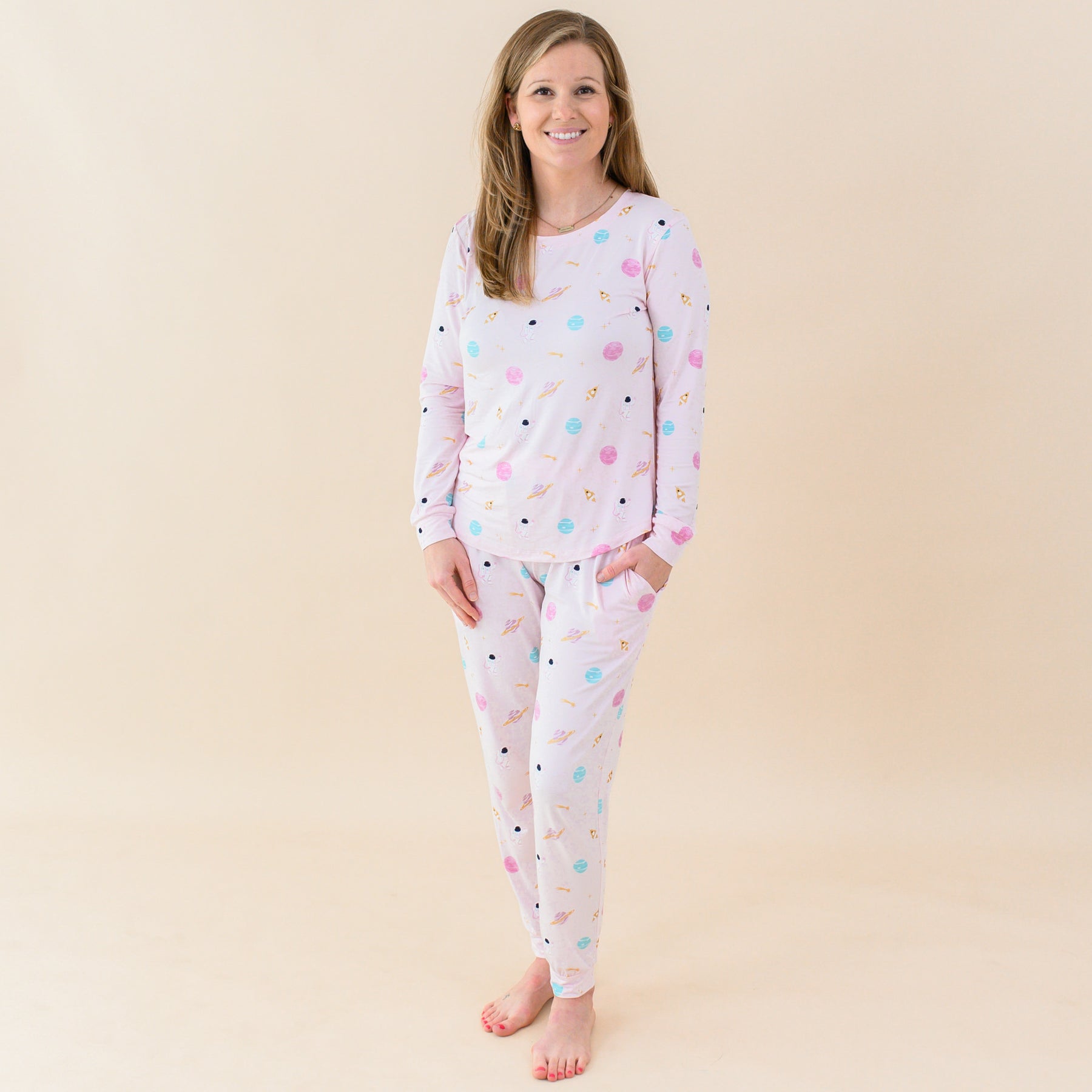 woman modeling women's sakura space jogger pajamas