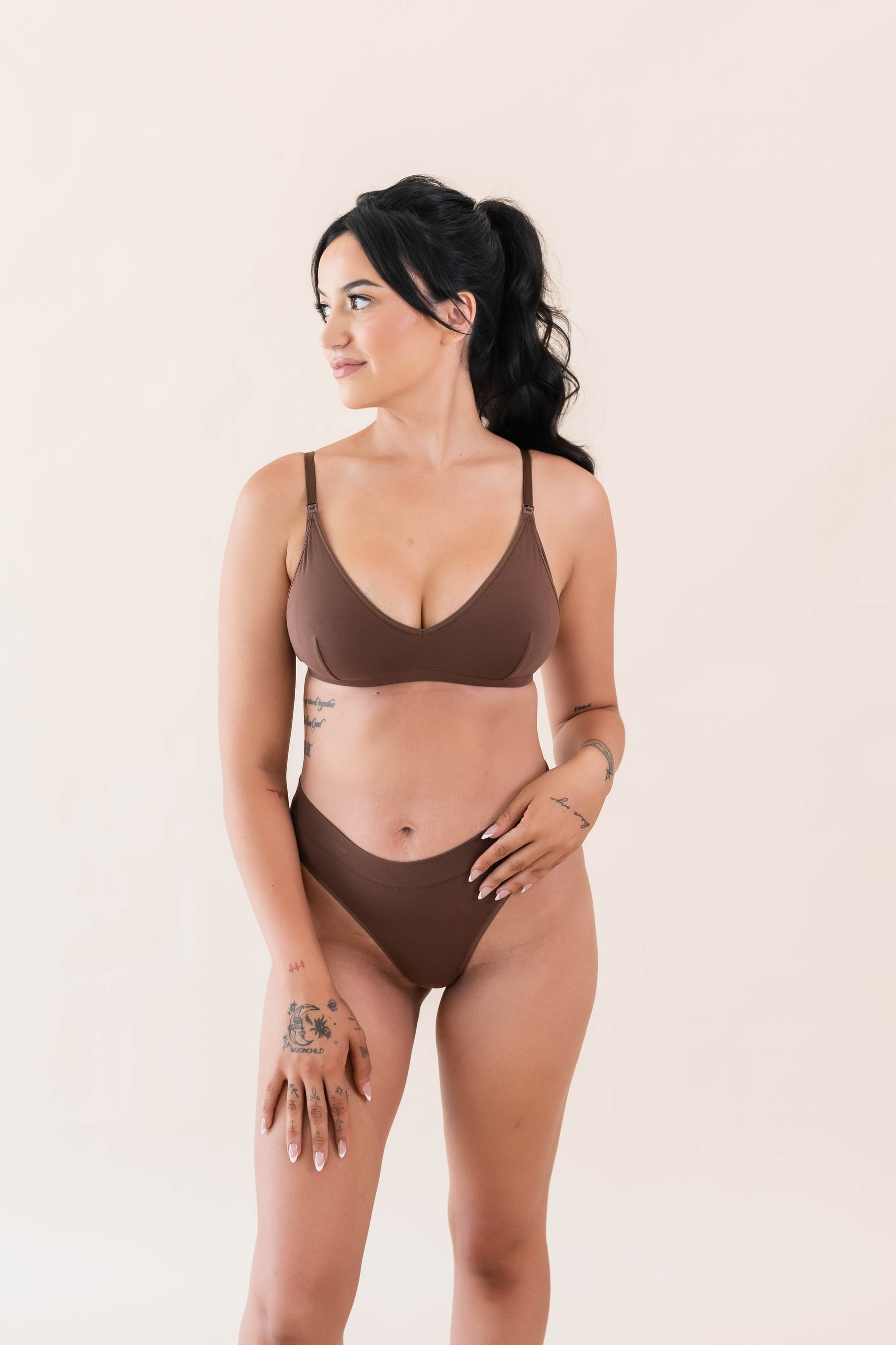 Female modeling the Women's Nursing Bra in Latte wearing matching underwear
