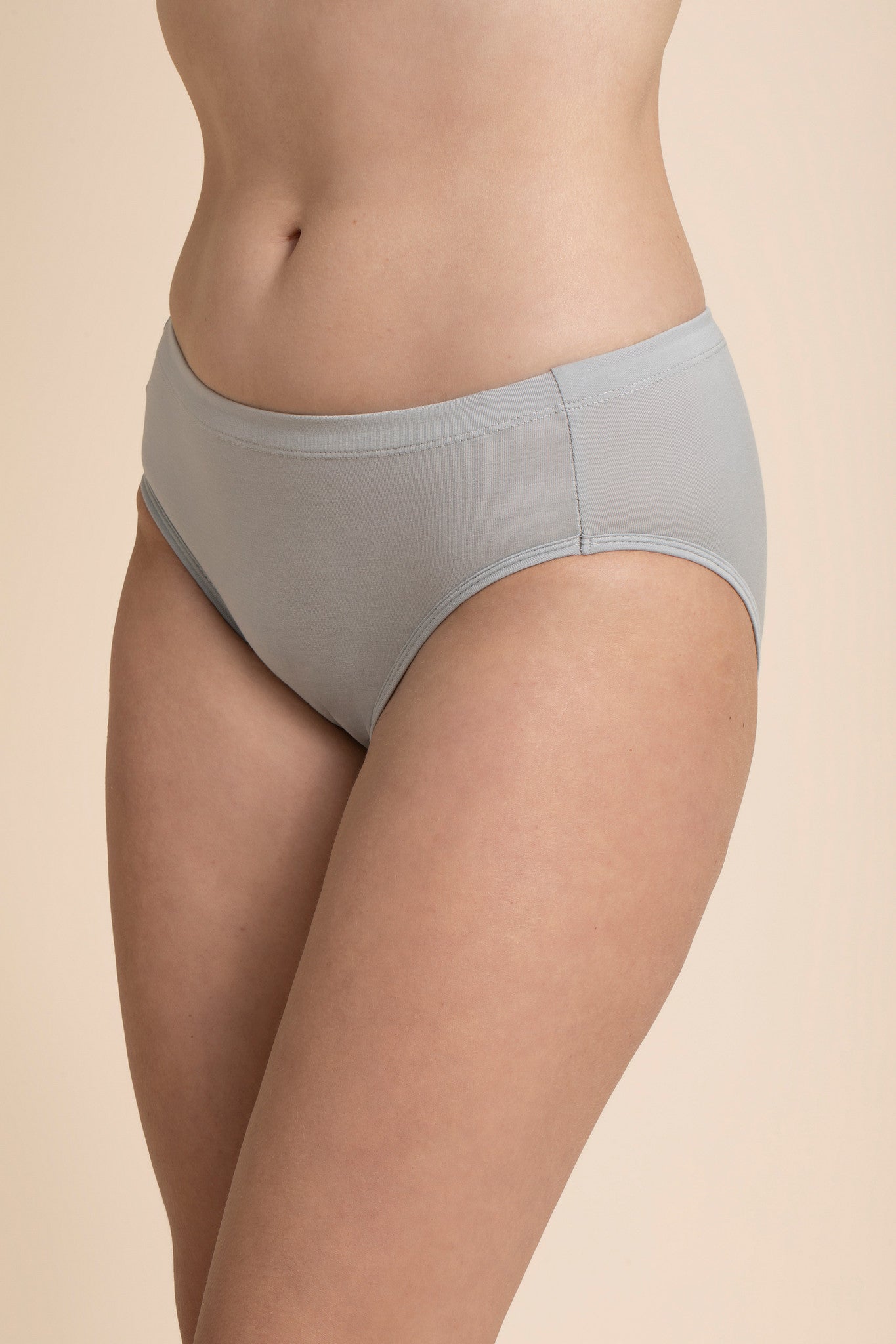 Light gray underwear on a beige background