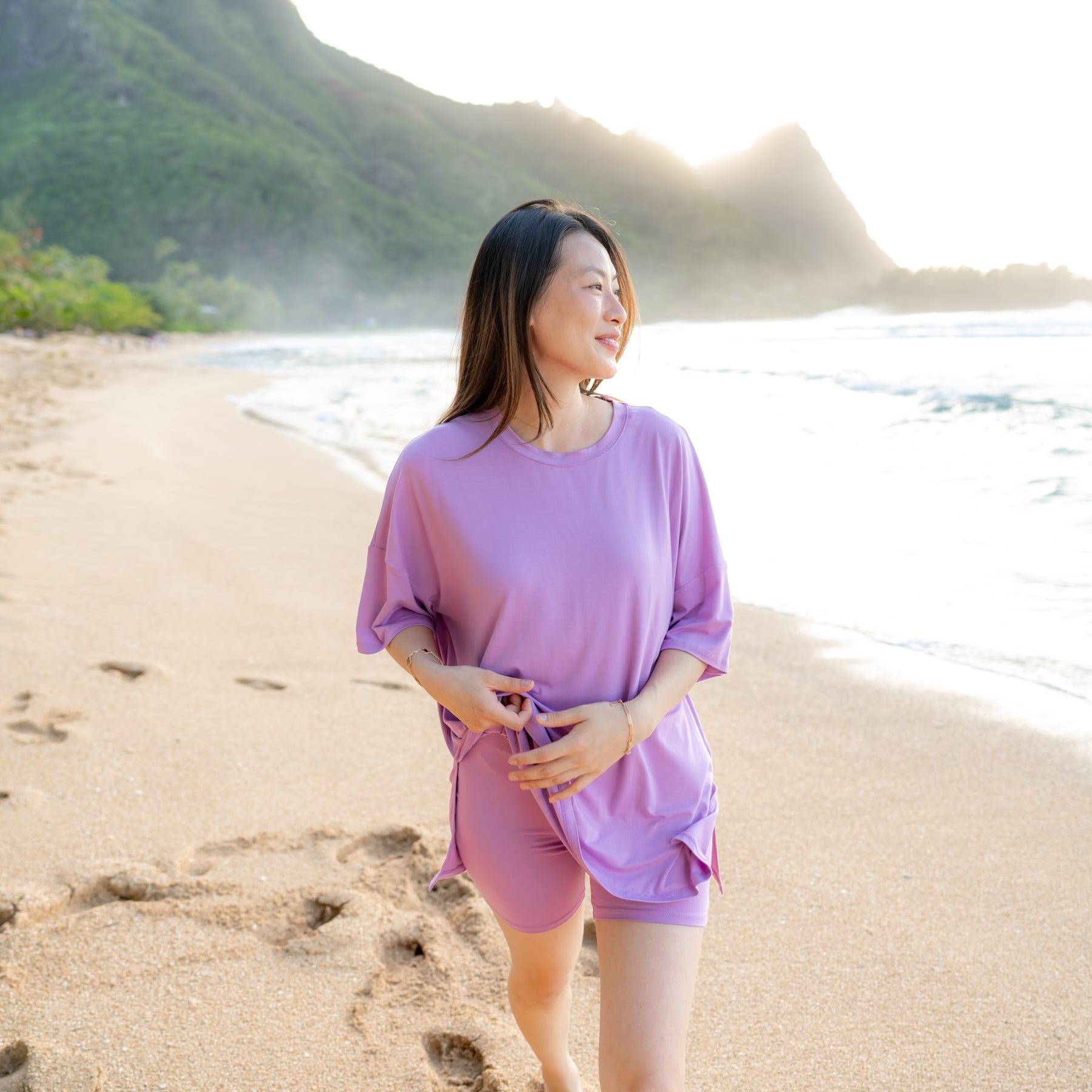 Woman modeling Women’s Biker Short Set in Poi on beach