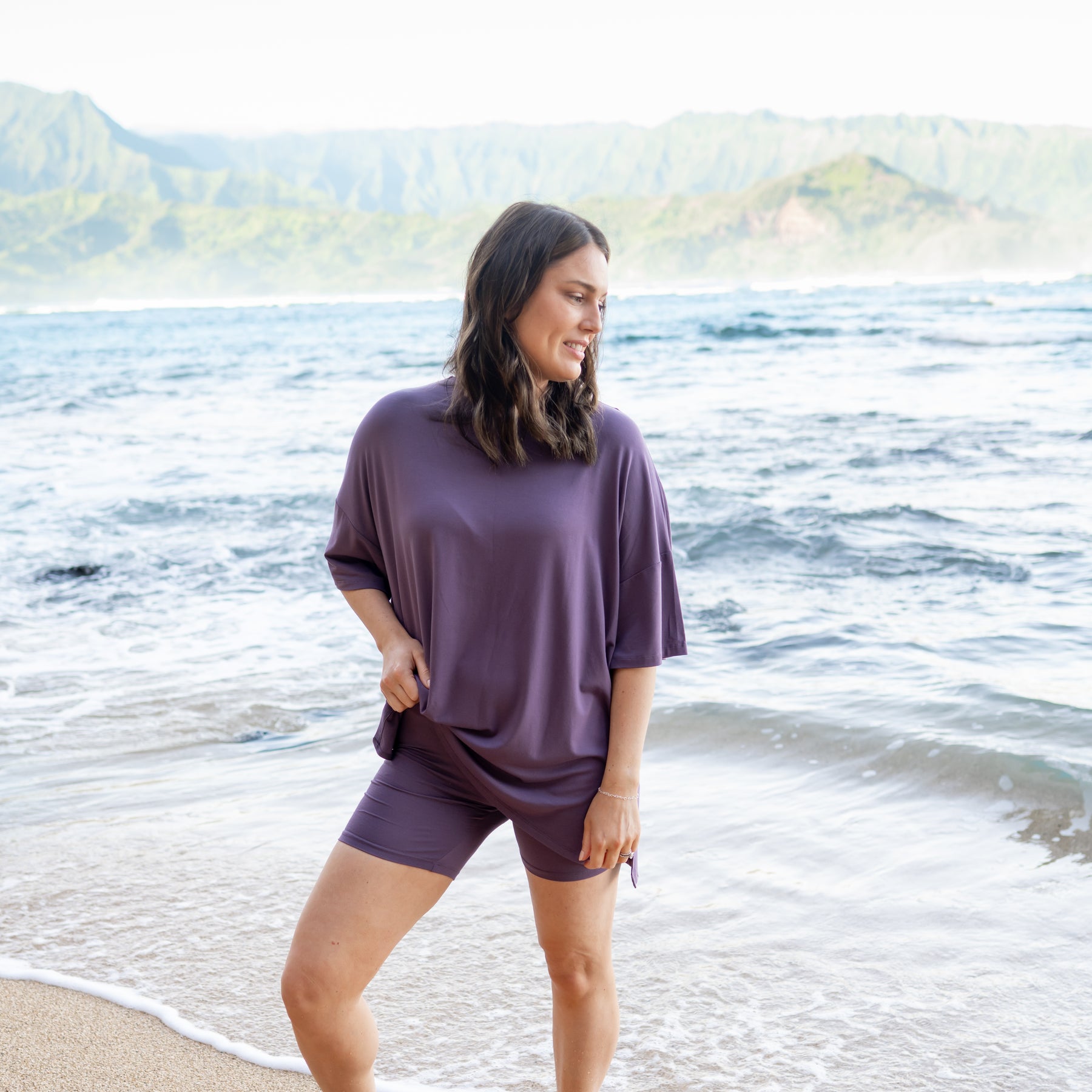 Woman modeling Women’s Biker Short Set in Currant on the beach