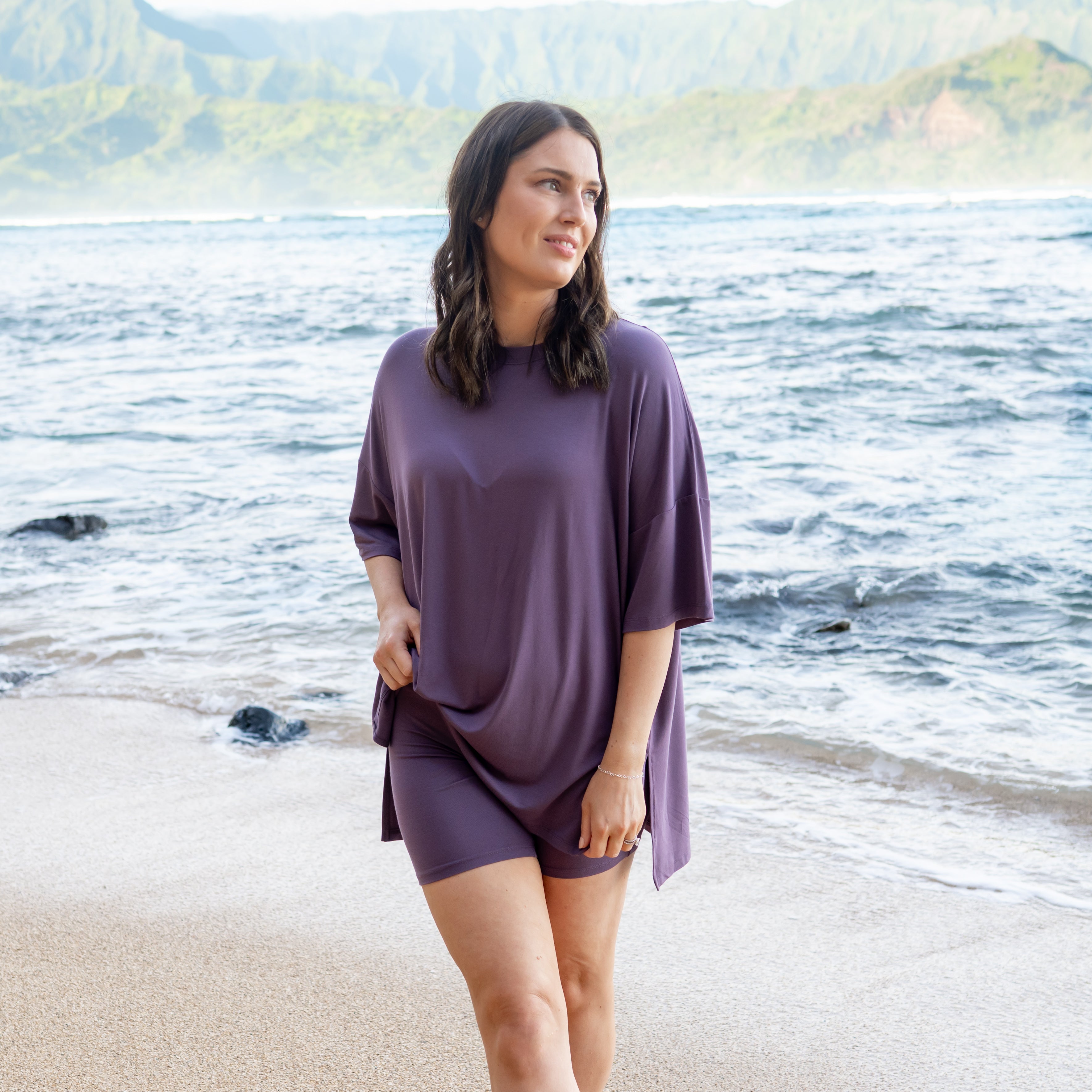 Woman modeling Women’s Biker Short Set in Currant on the beach