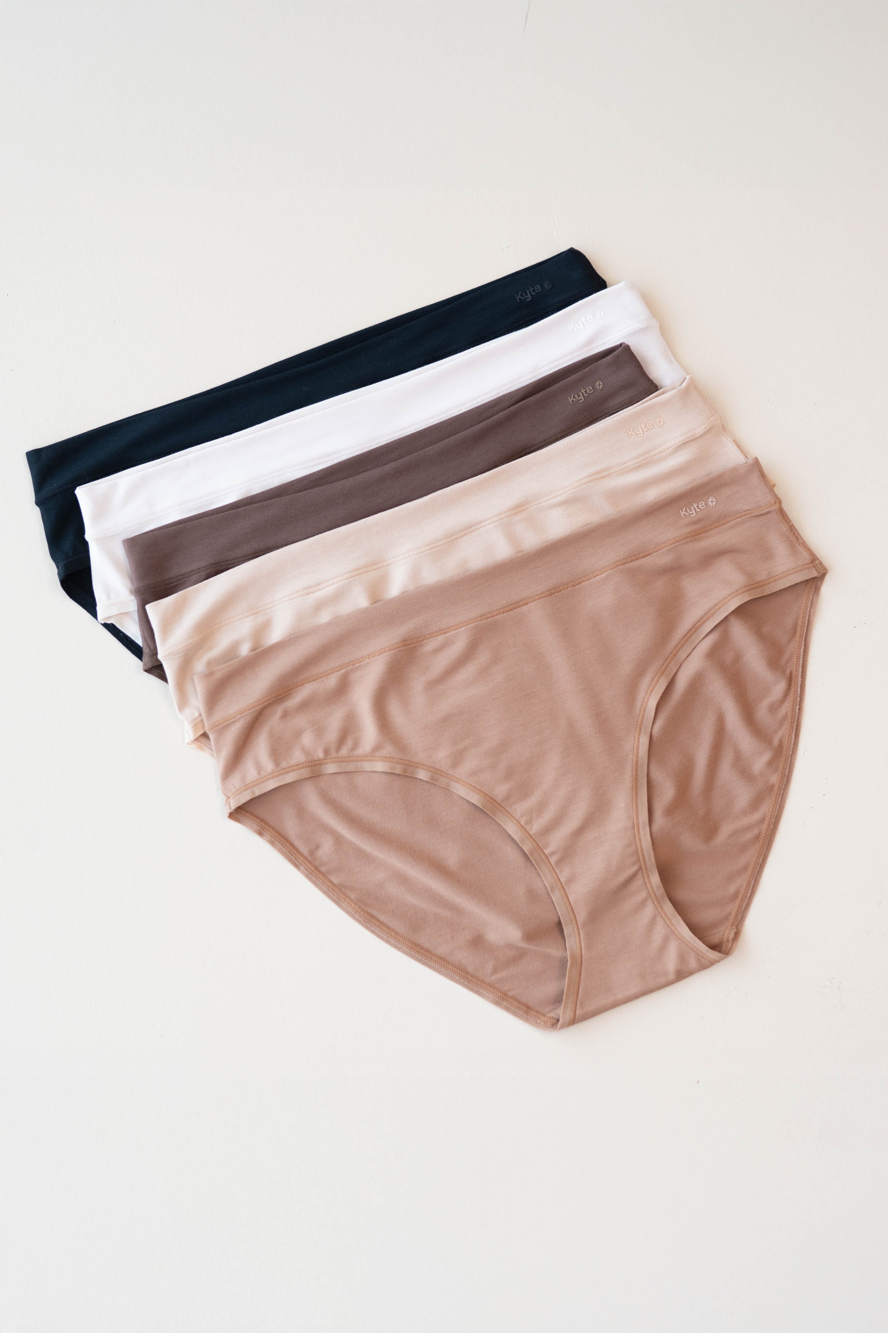 Flat lay of the Women's Midi Brief in neutral colors