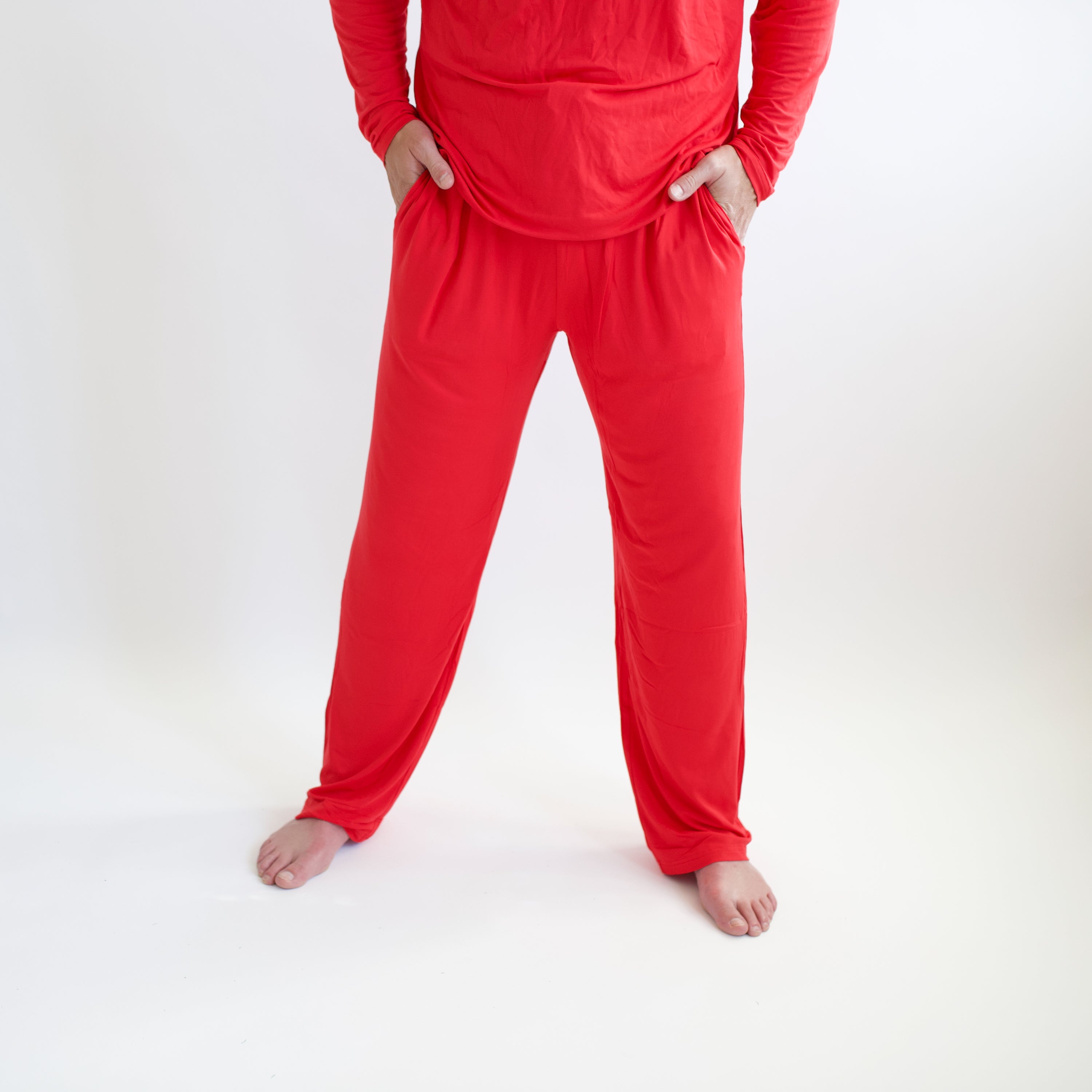 Men's Lounge Pants in Cardinal shown on a male model with a white backdrop