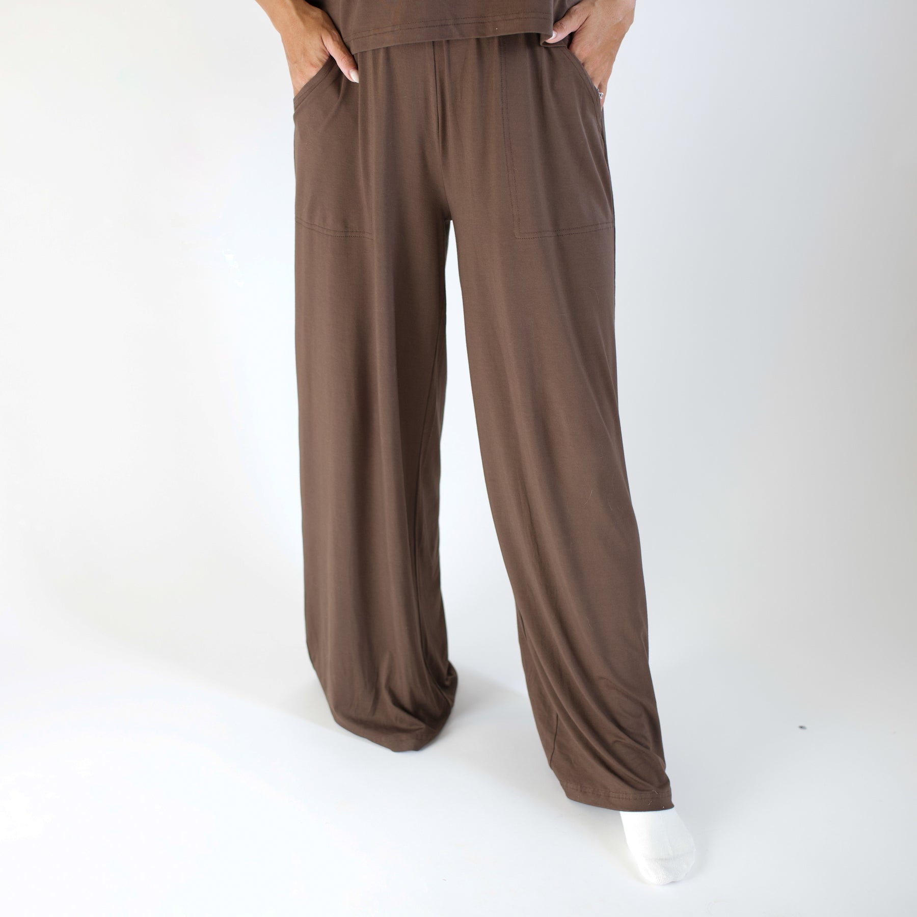 Brown wide-leg pants on a white background