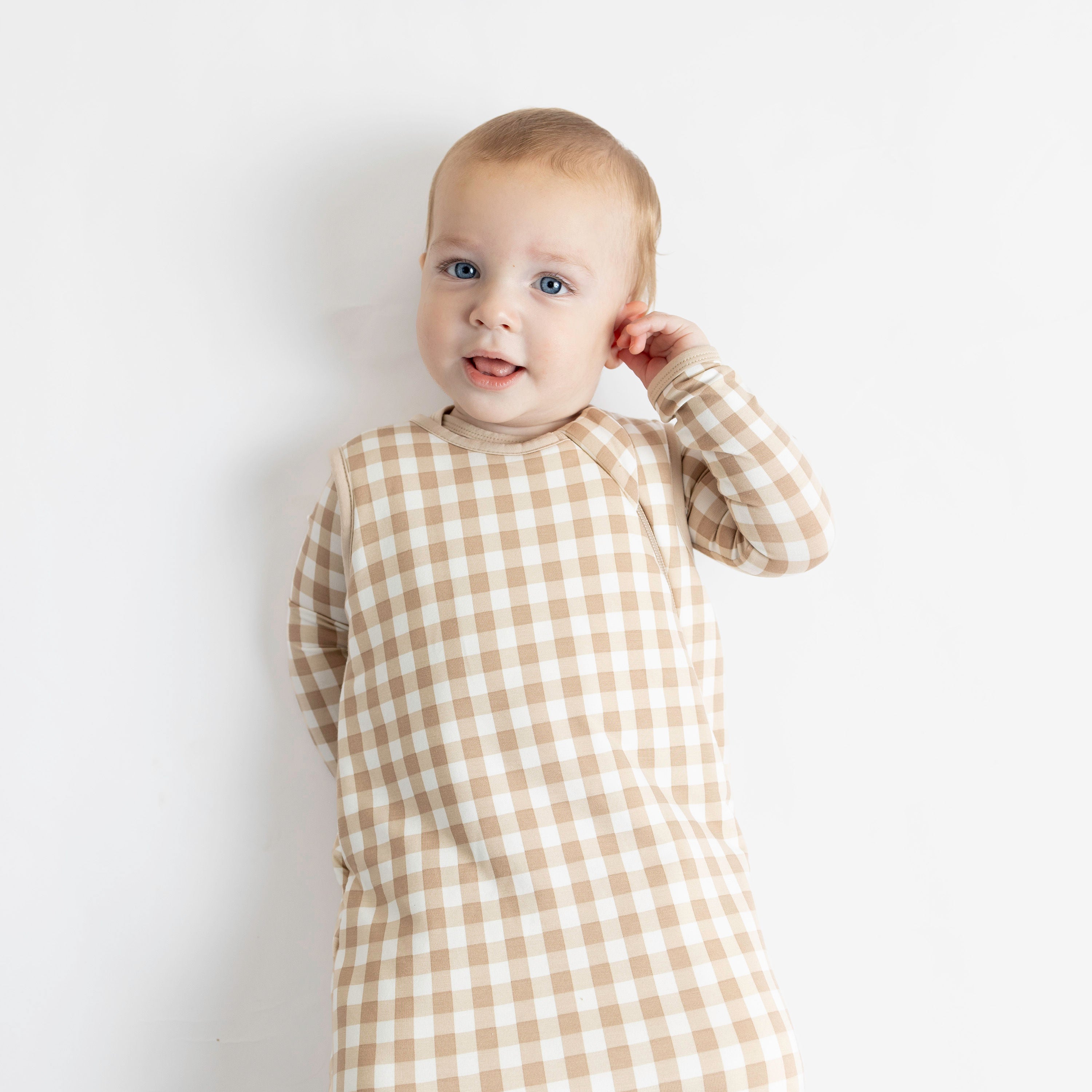 Child wearing Sleep Bag in Gingham Bisque 2.5 with matching pajamas