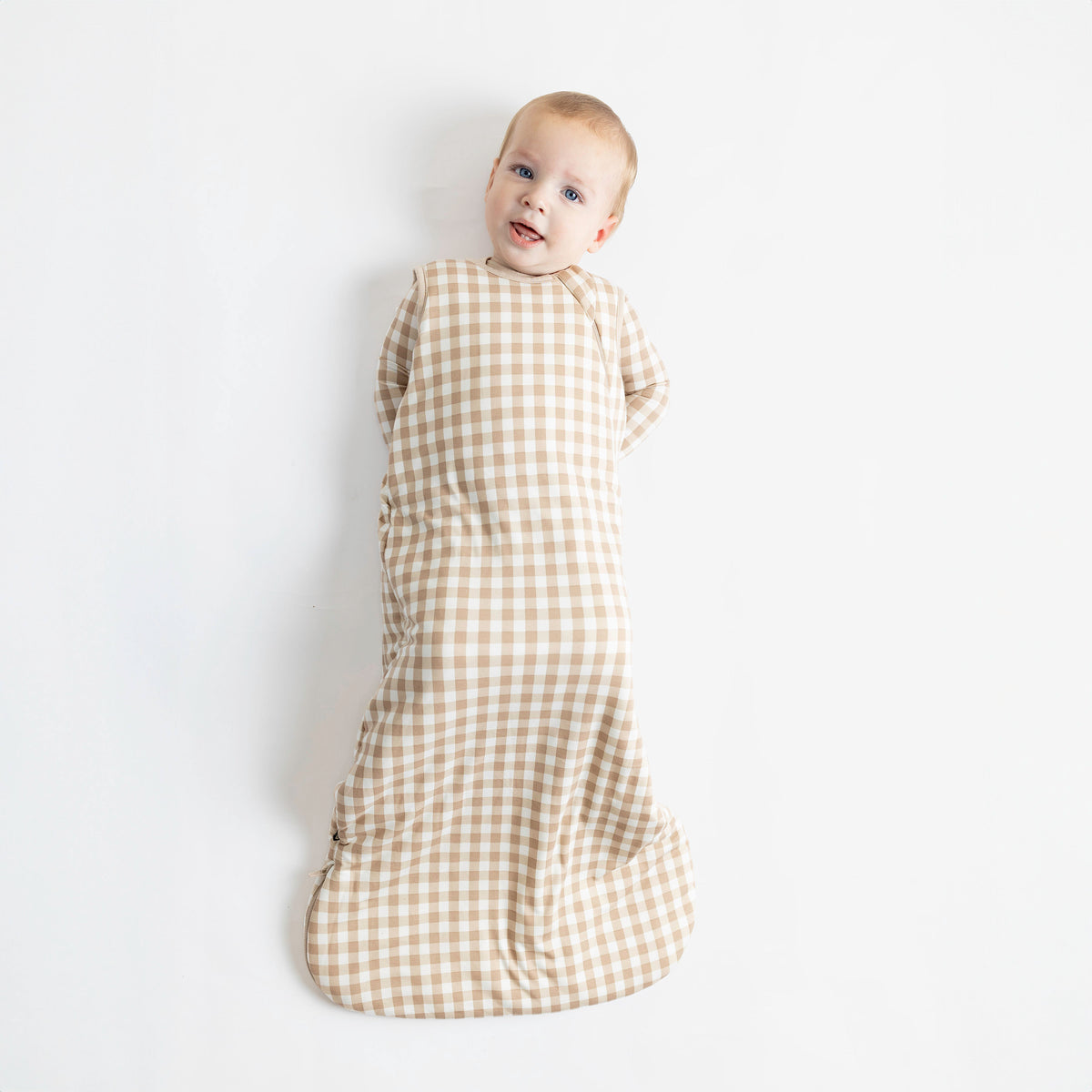 Baby wearing Sleep Bag in Gingham Bisque 2.5