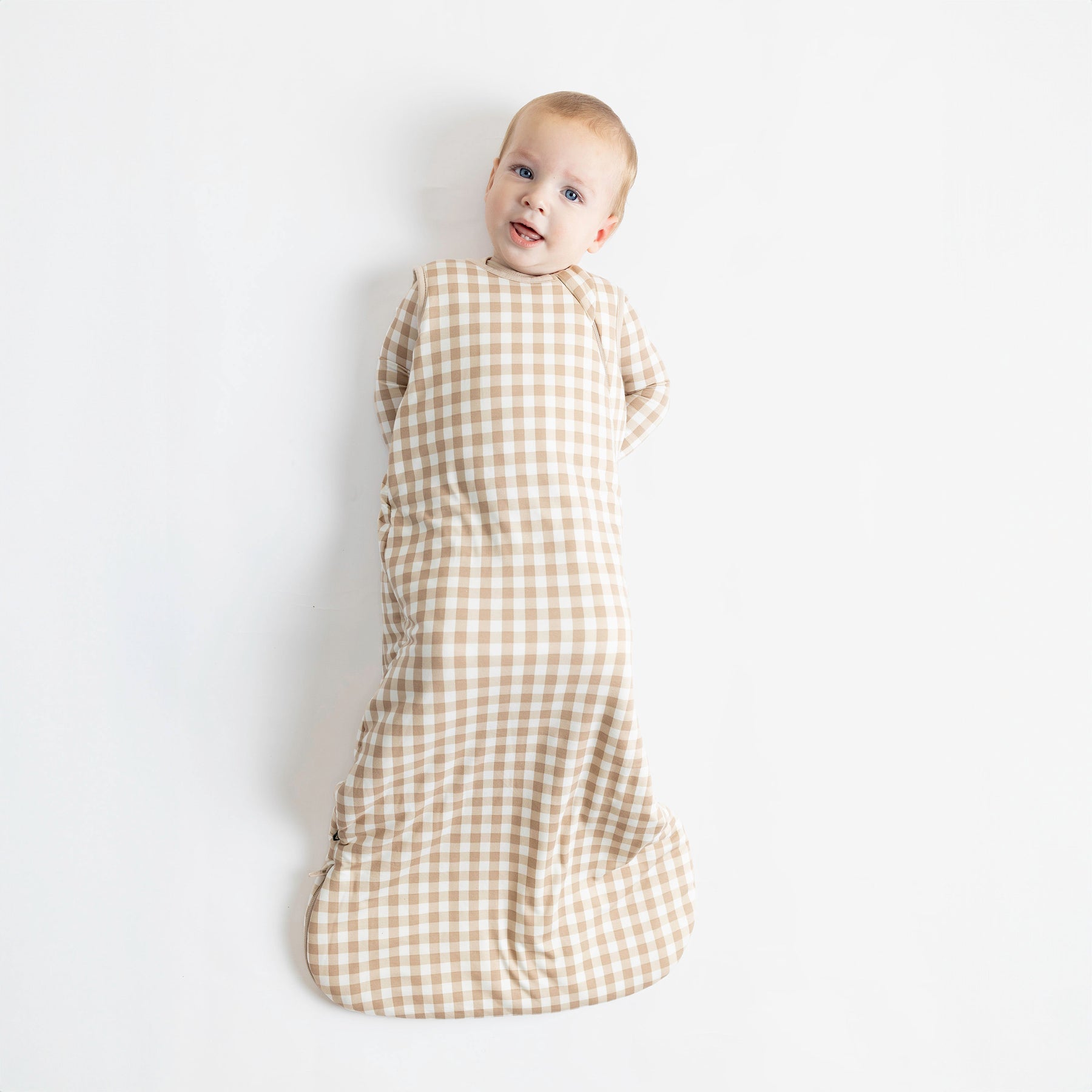 Baby wearing Sleep Bag in Gingham Bisque 2.5