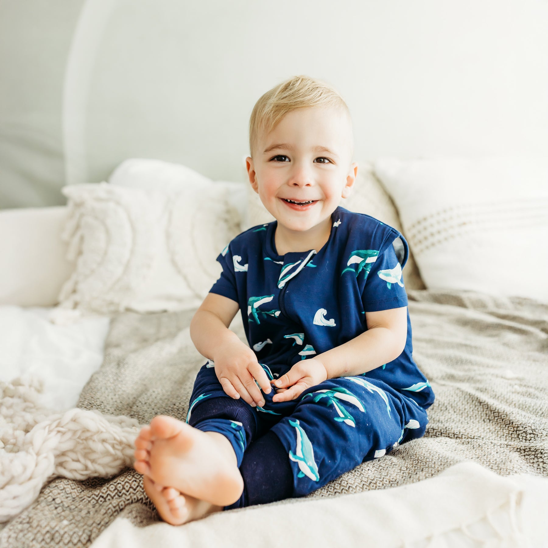 toddler wearing humpback sleep bag walker