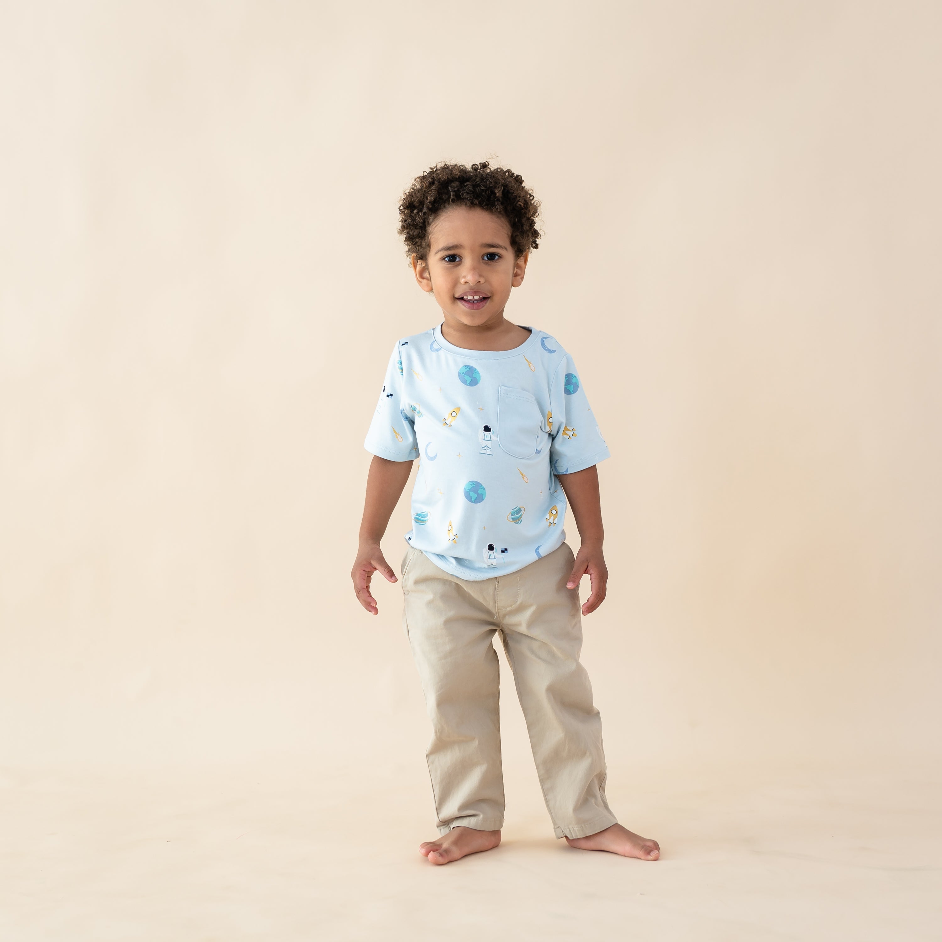 toddler wearing ice space crew neck tee and khaki pants