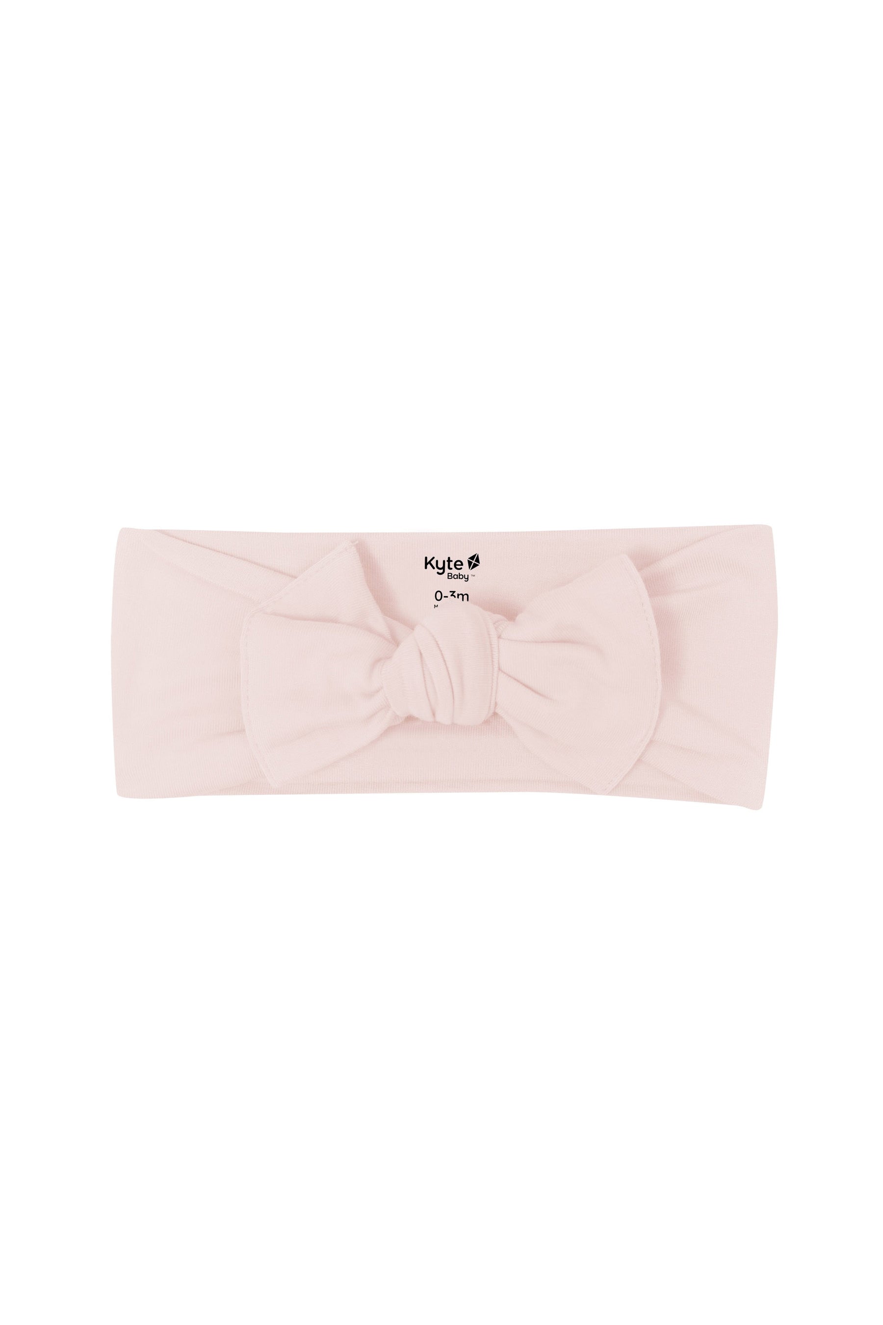 Flat lay of Kyte Baby Bow in Blush