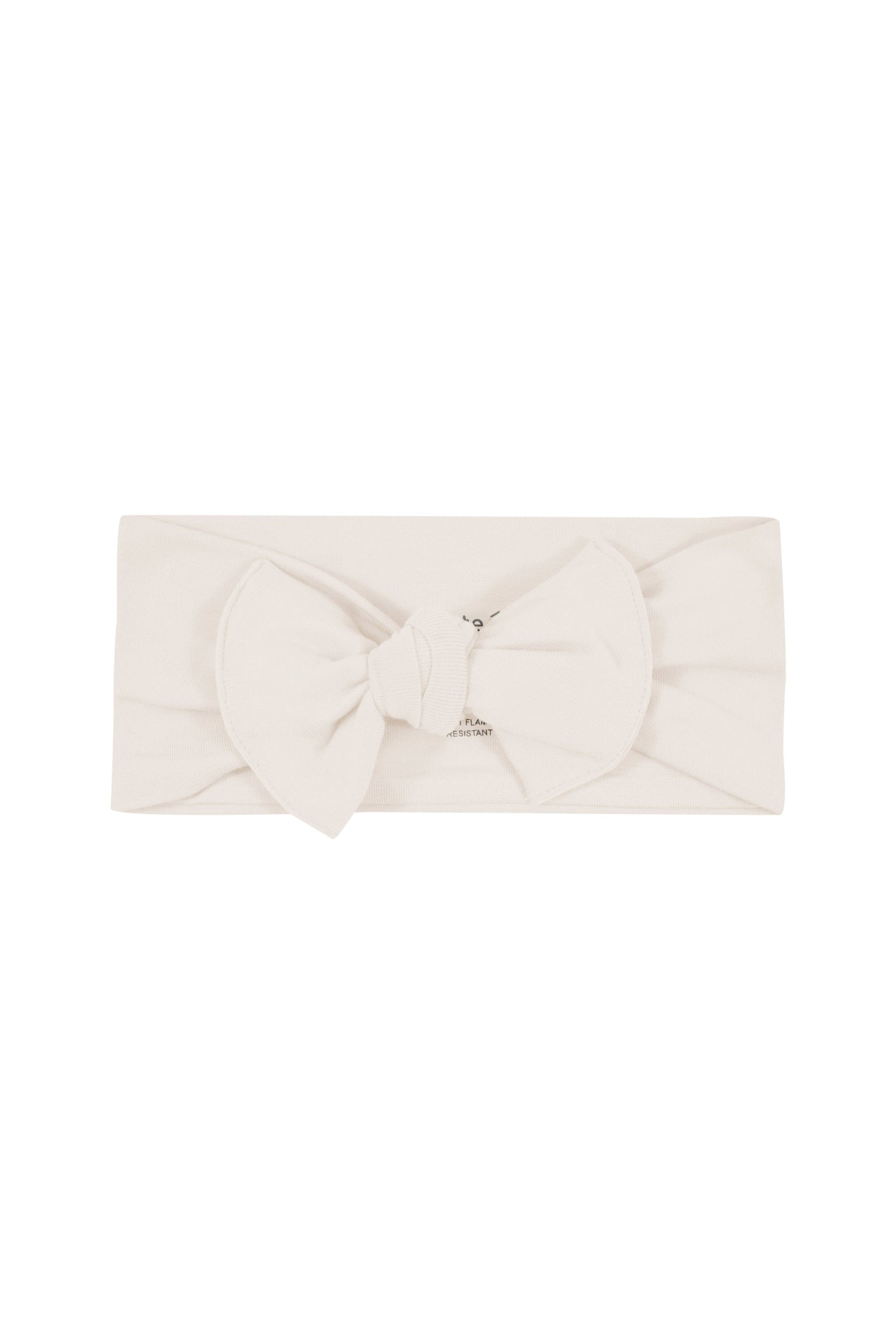Flat lay of Kyte Baby Bow in Oat