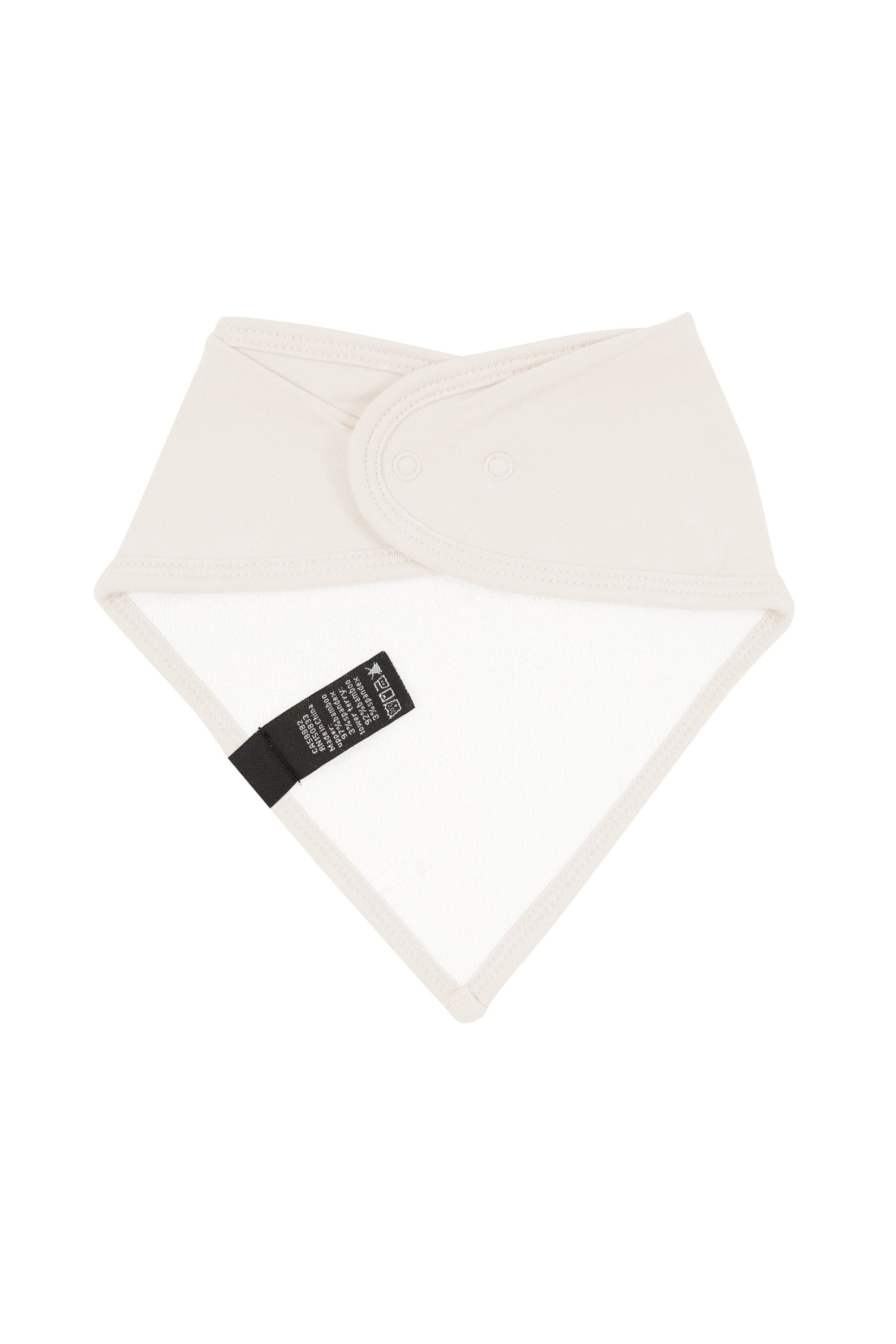 Bamboo terry lining on Kyte Baby Bib in Oat