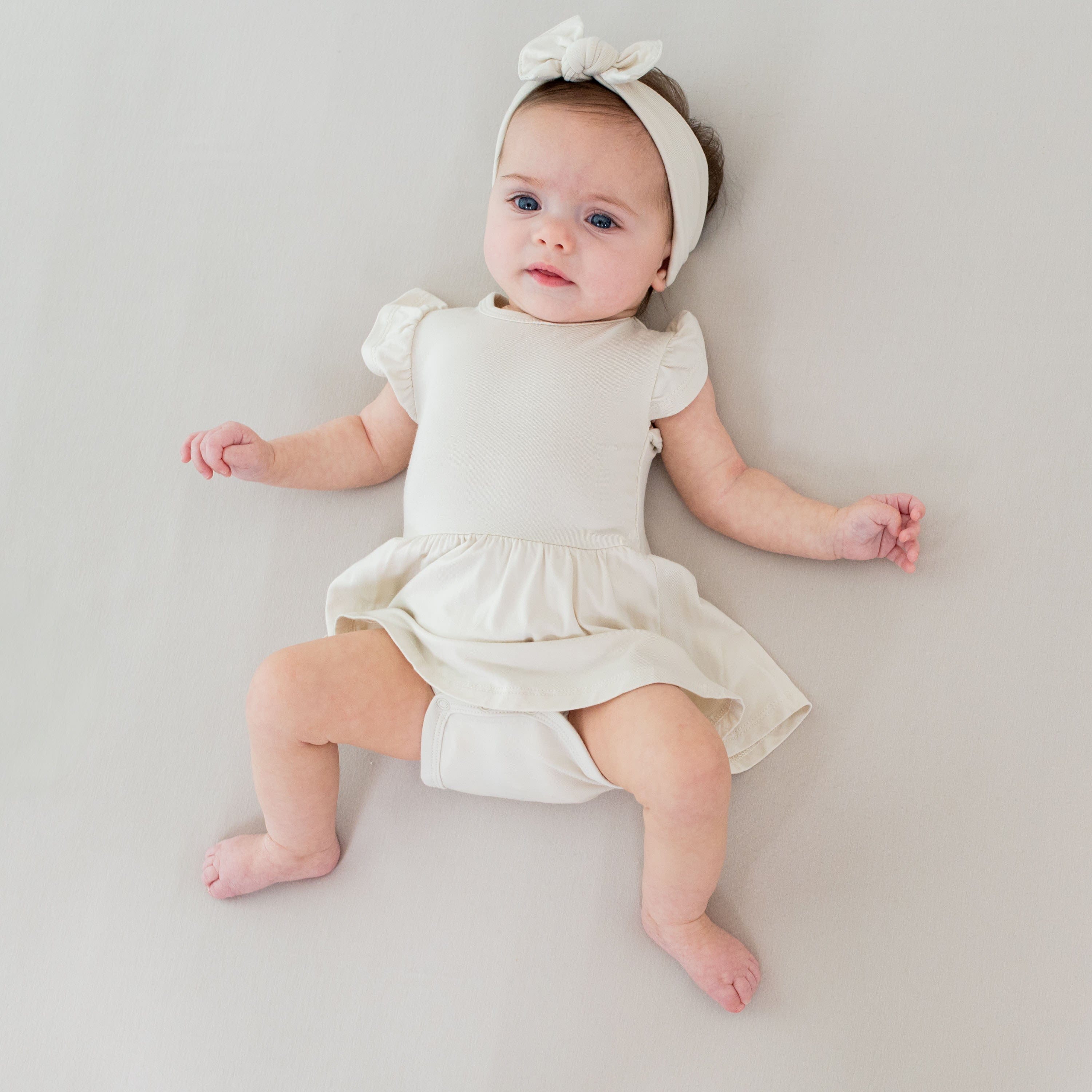 Kyte Baby Bodysuit Dress Twirl Bodysuit Dress in Ecru