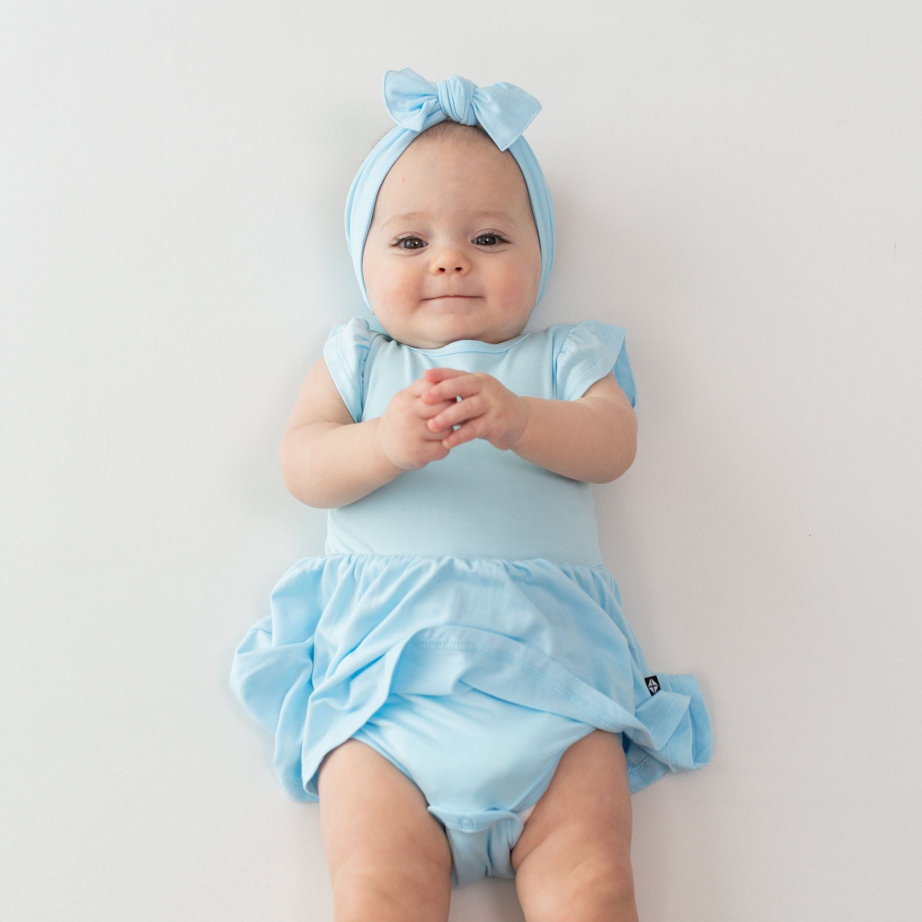 Kyte Baby Bodysuit Dress Twirl Bodysuit Dress in Powder