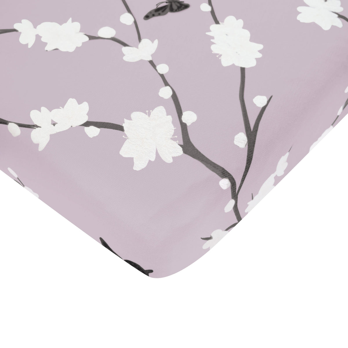 Kyte Baby Crib Sheet in purple with cherry blossom pattern