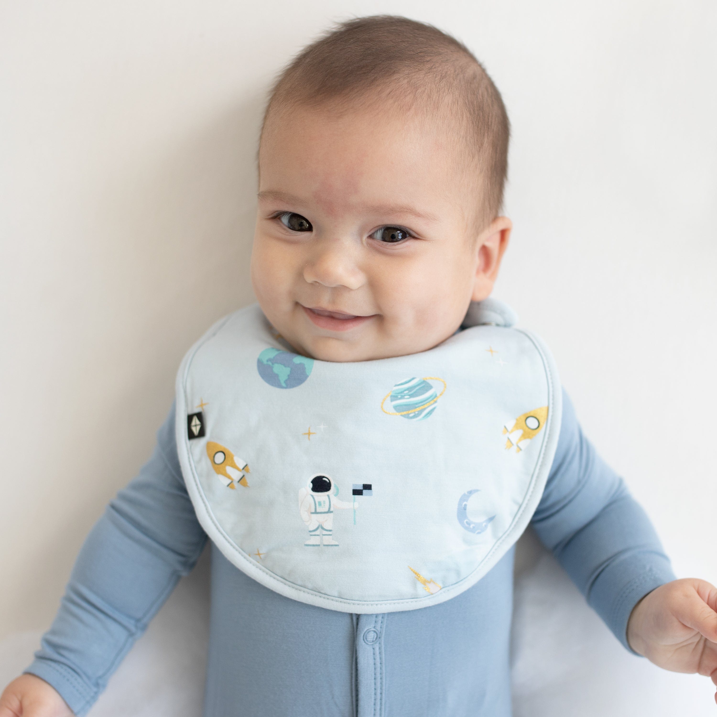 Kyte Baby Cushy Bib Cushy Bib in Ice Space