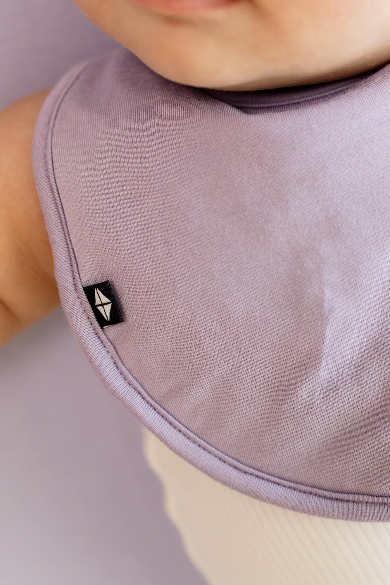 Kyte Baby Bamboo Cushy Bib in Taro purple