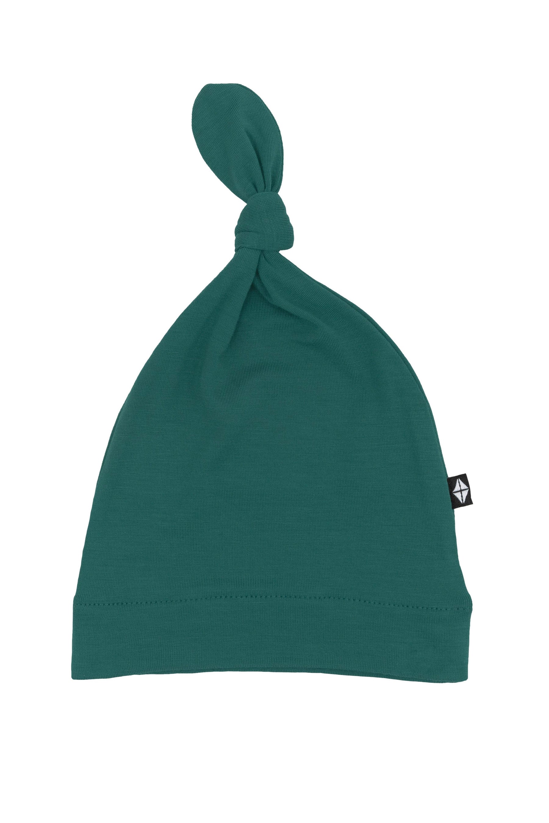 Flat lay of Kyte Baby Knotted Cap in Emerald