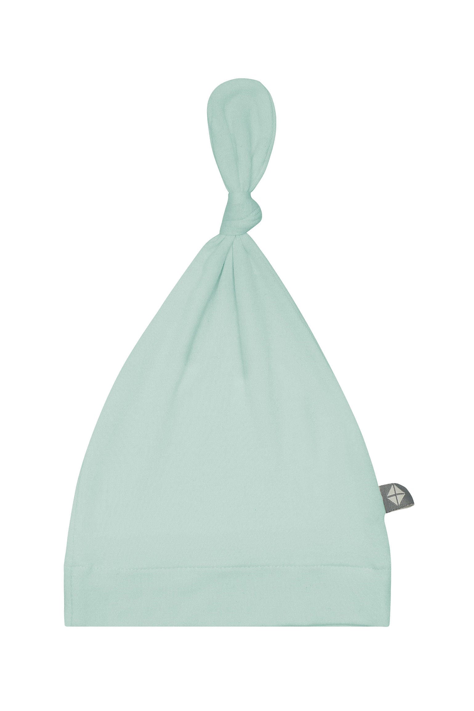 Flat lay of Kyte Baby Knotted Cap in Sage