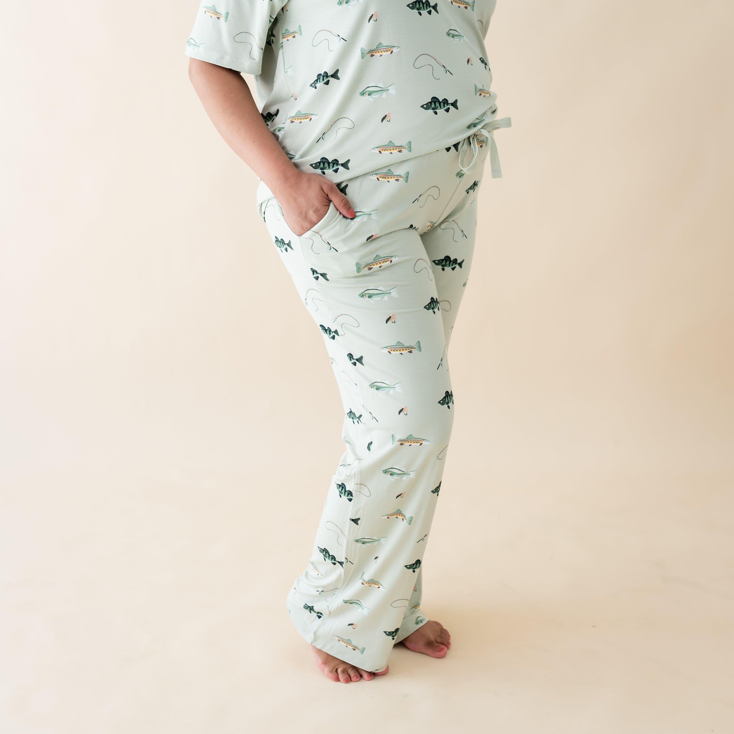 Woman wearing bamboo Kyte Baby Women's Lounge Pants in Fishing with matching top