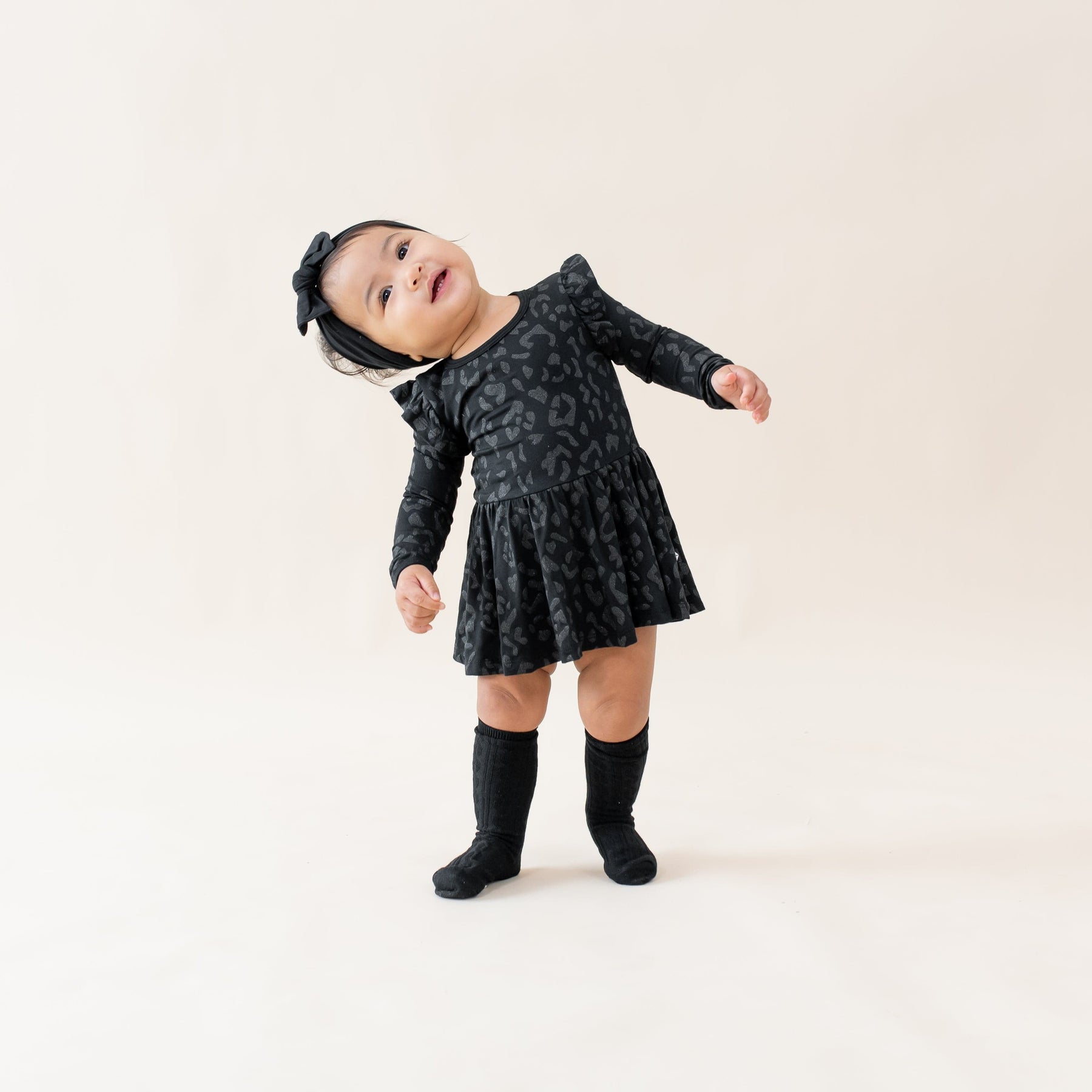 Kyte Baby LS Twirl Bodysuit Dress Long Sleeve Twirl Bodysuit Dress in Midnight Leopard