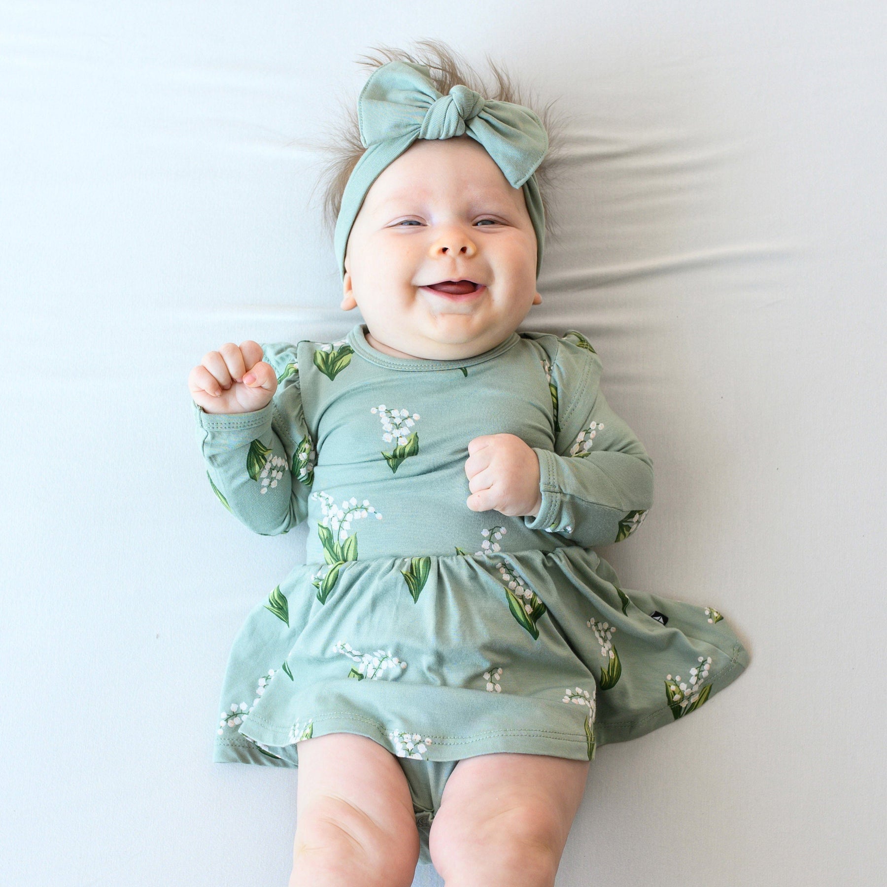 Kyte Baby LS Twirl Bodysuit Dress Long Sleeve Twirl Bodysuit Dress in Thyme Lily