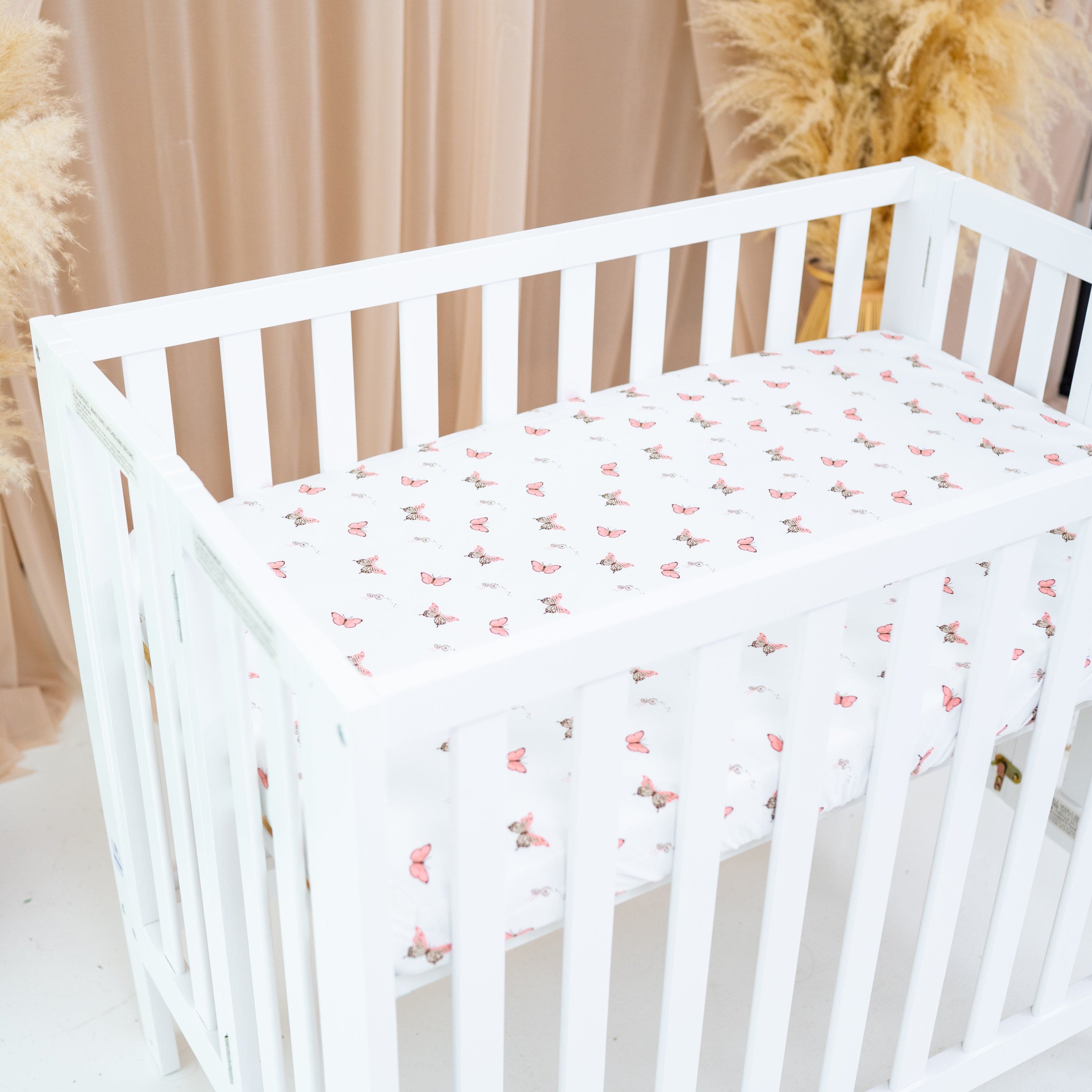 Nursery with Kyte Baby bamboo Mini Crib Sheet in Butterfly