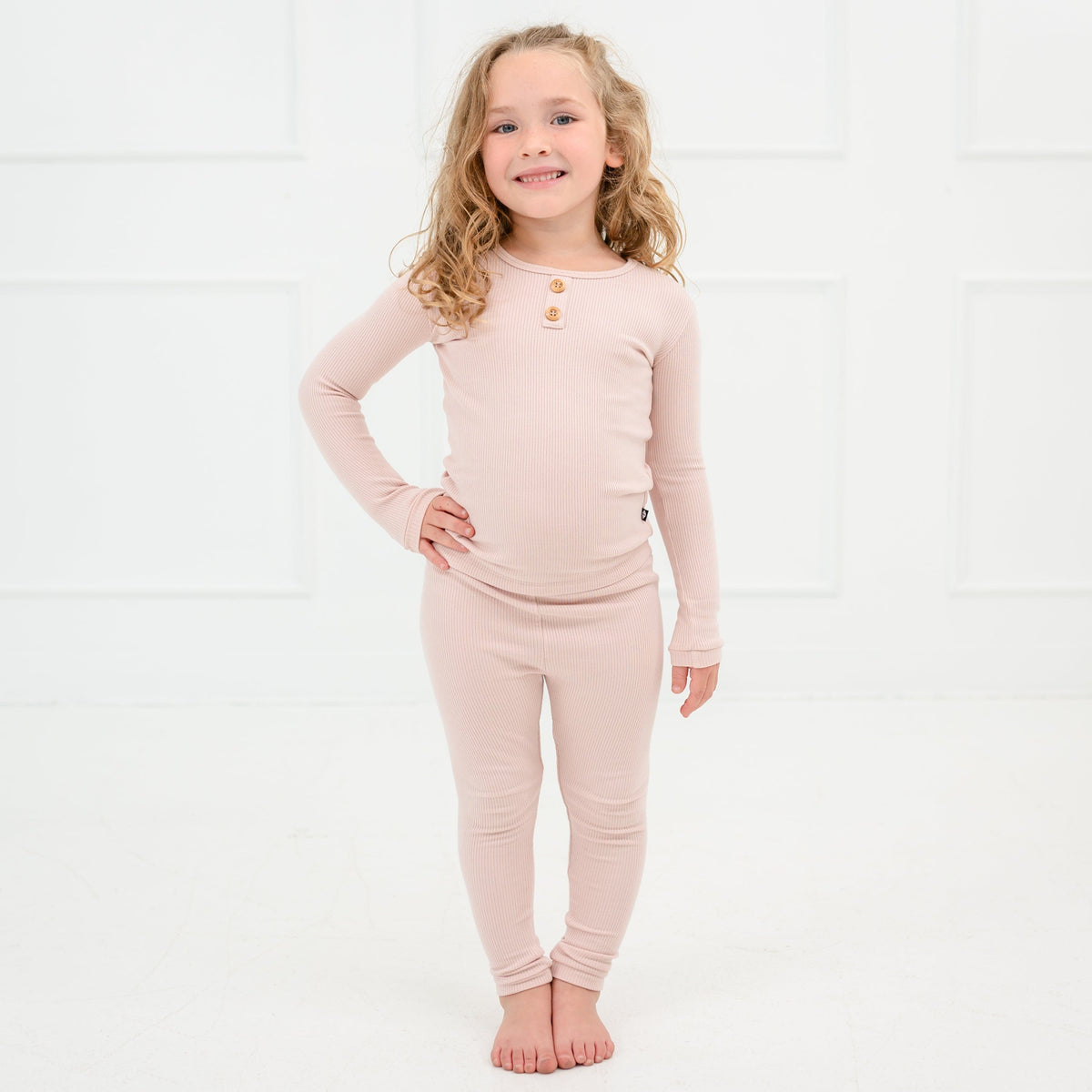 Toddler wearing Kyte Baby Ribbed Henley Set in Blush