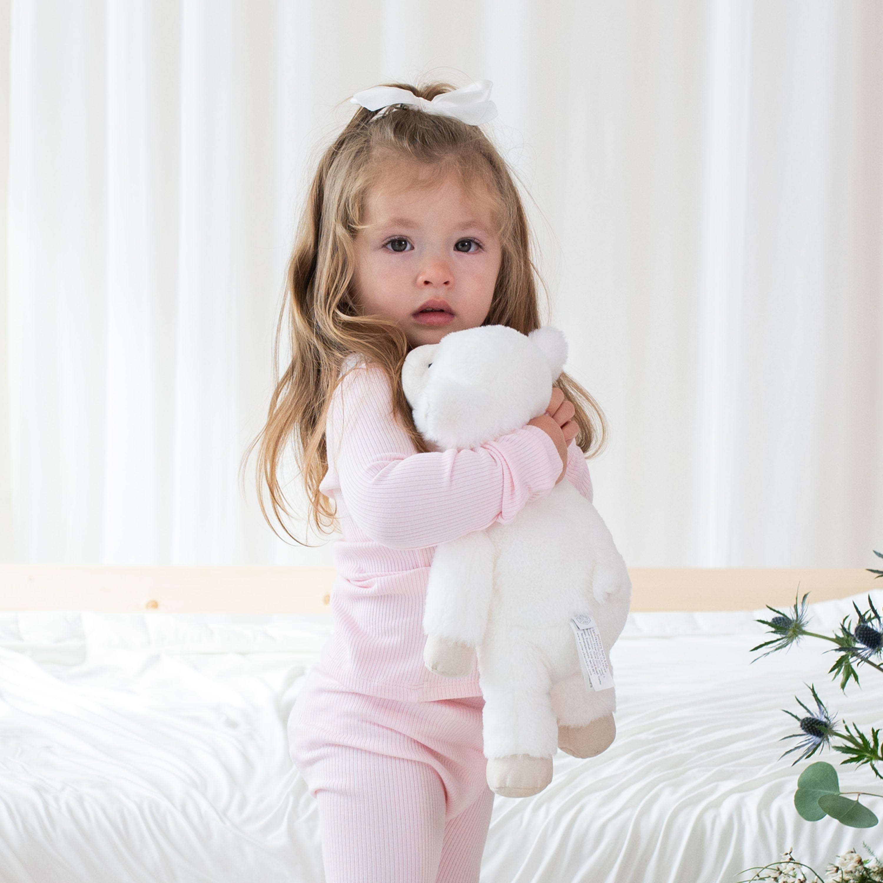 Toddler wearing Kyte Baby Ribbed Henley Set in Sakura pink